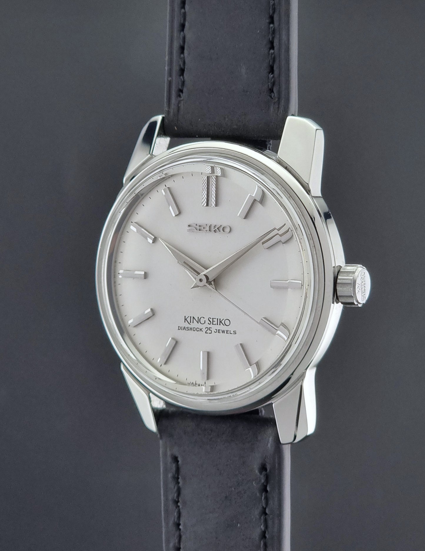 Vintage King Seiko 44-999 Watch with black leather strap on a dark background
