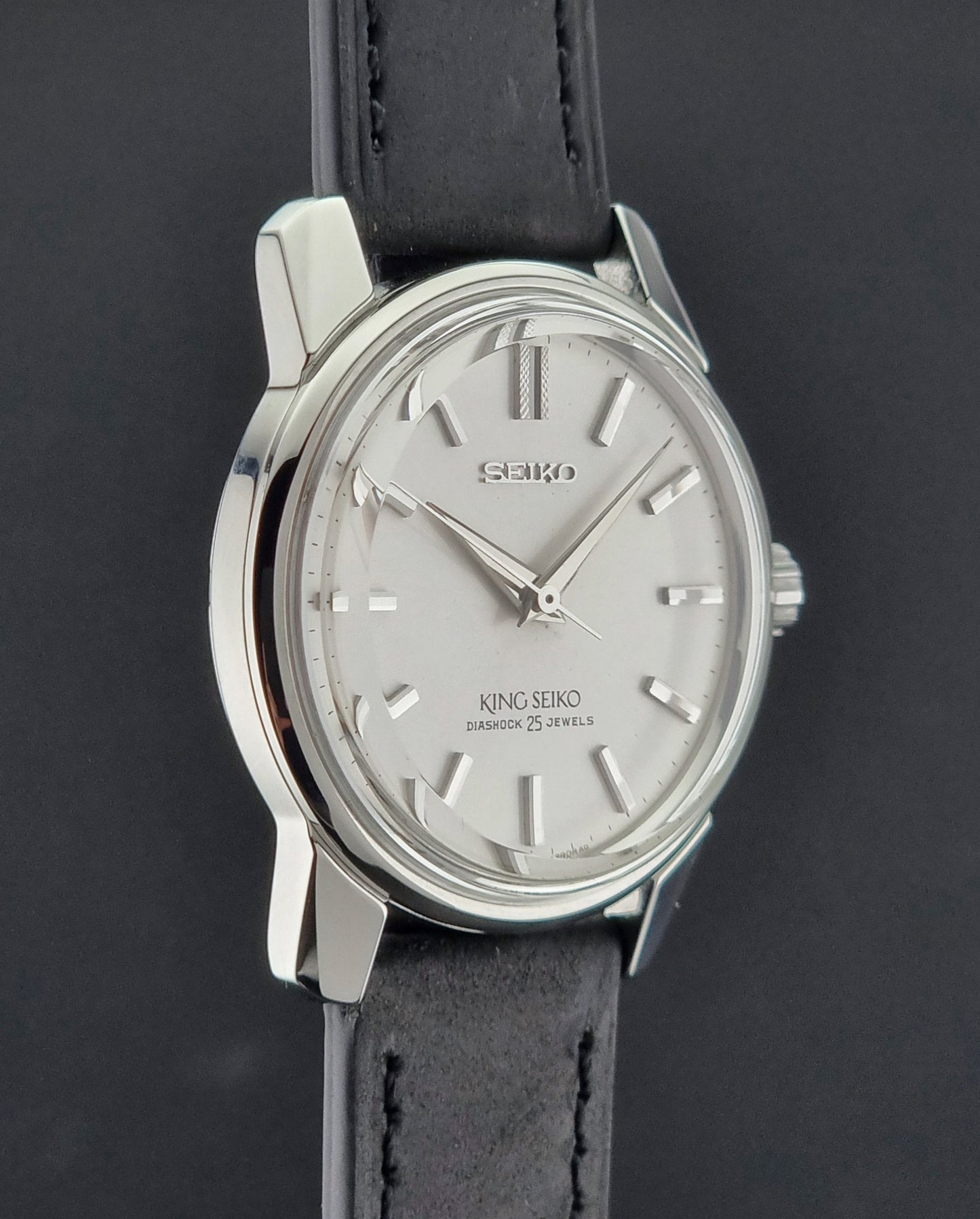 Vintage King Seiko 44-999 Watch with black leather strap on a dark background