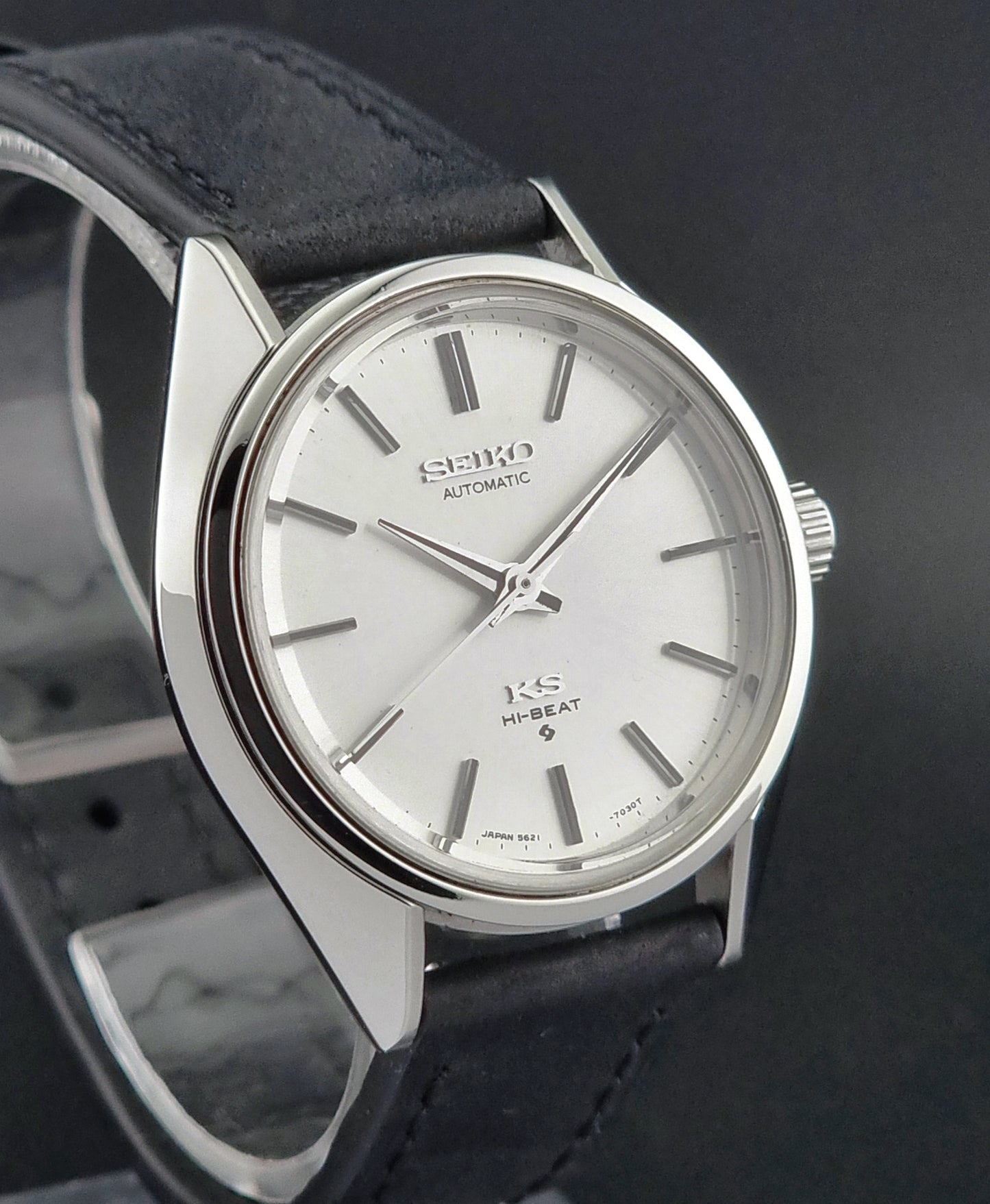 King Seiko watch with black leather strap on a dark background