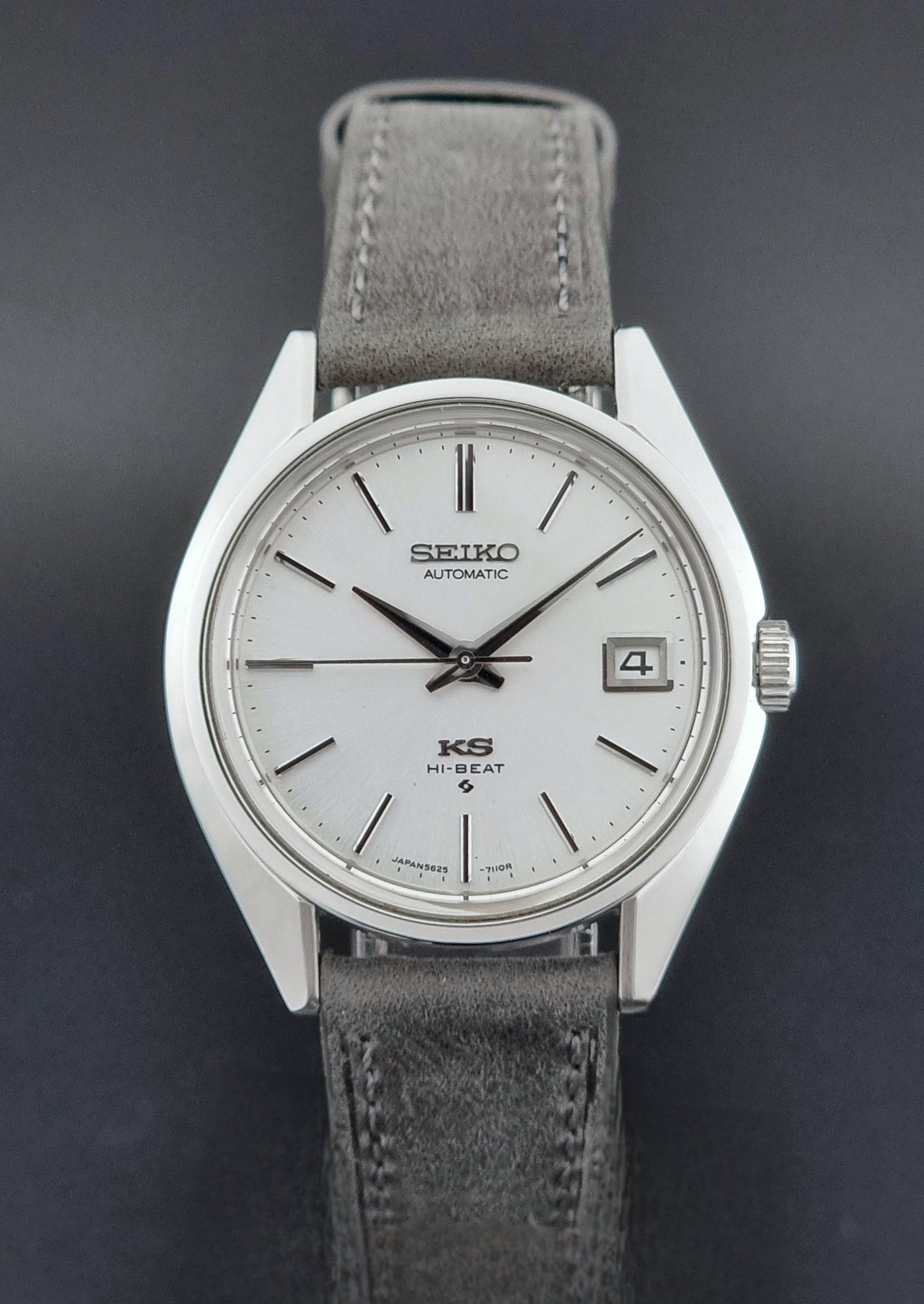 Vintage King Seiko Wristwatch 5625-7111 on a grey leather strap