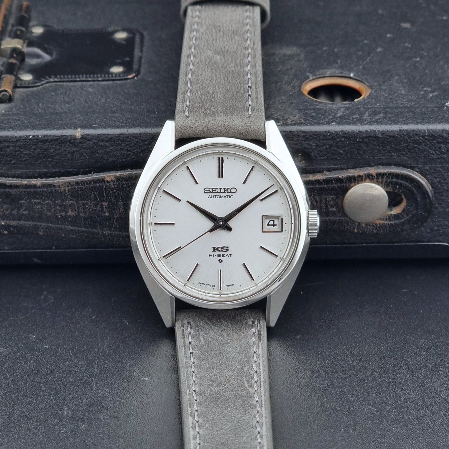 Vintage King Seiko Wristwatch 5625-7111 on a grey leather strap