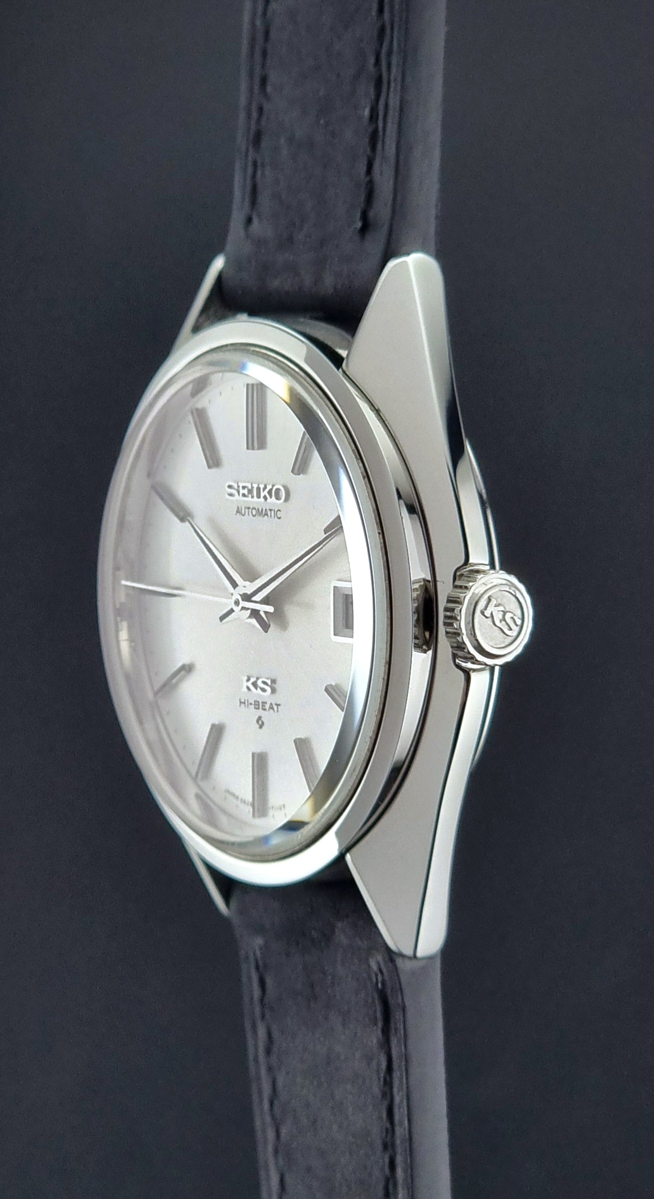 Vintage King Seiko watch with a white dial crown side view