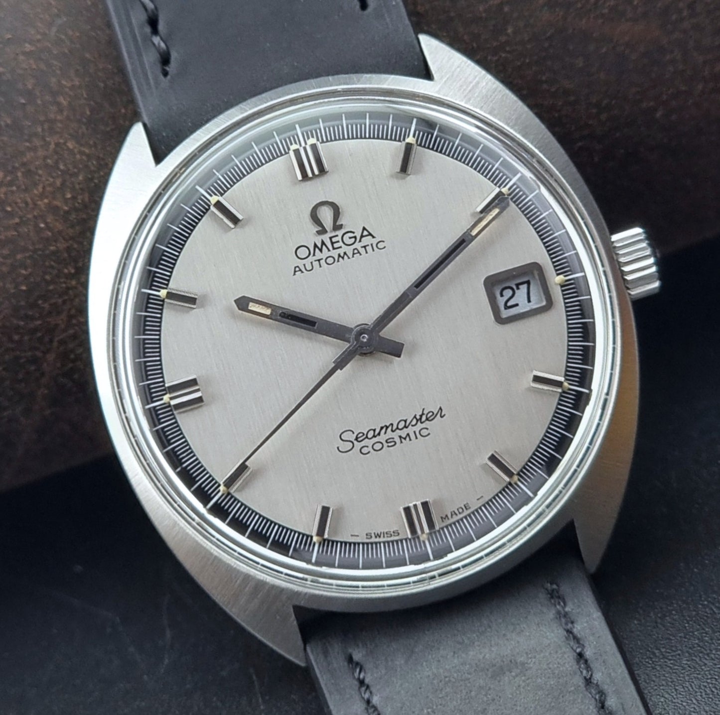Omega Seamaster Cosmic watch with silver dial and black leather strap