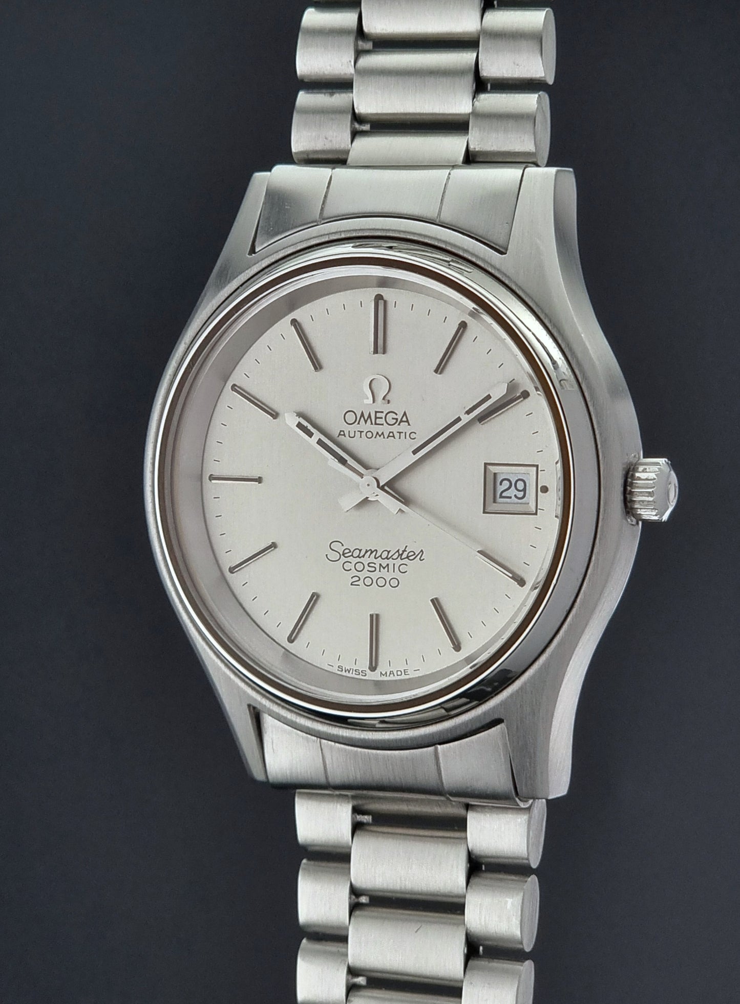Vintage Omega Seamaster watch with a dark background