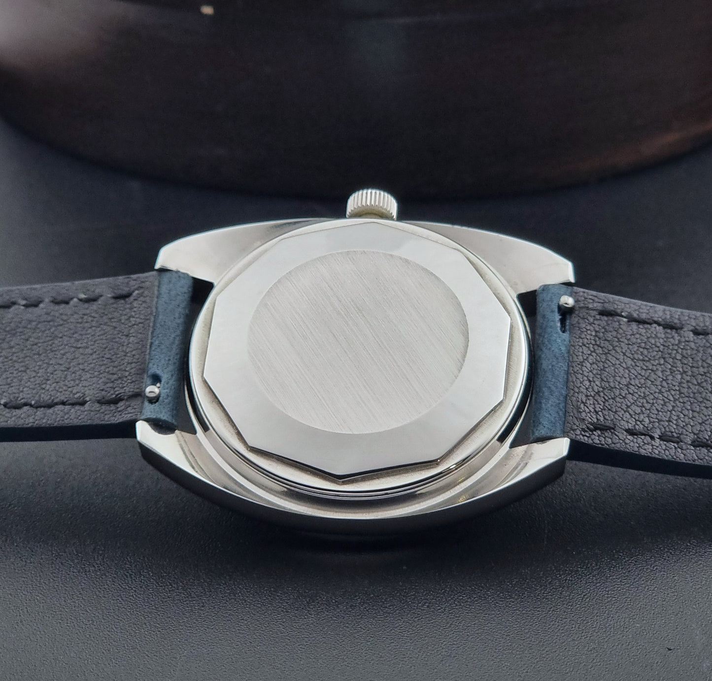 Vintage Tissot Wristwatch Seastar 46660-4Xh with blue strap on a dark surface case back view