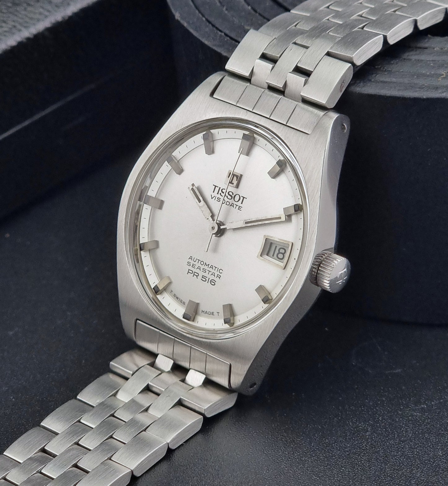 Tissot Seastar Visodate watch with a white face on a dark surface