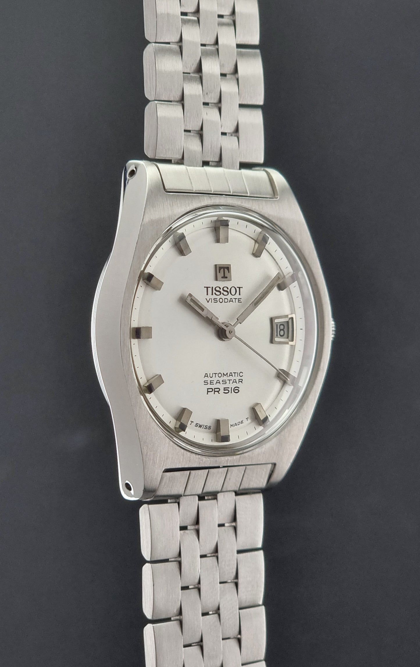 Tissot Seastar Visodate watch with a dark gray background