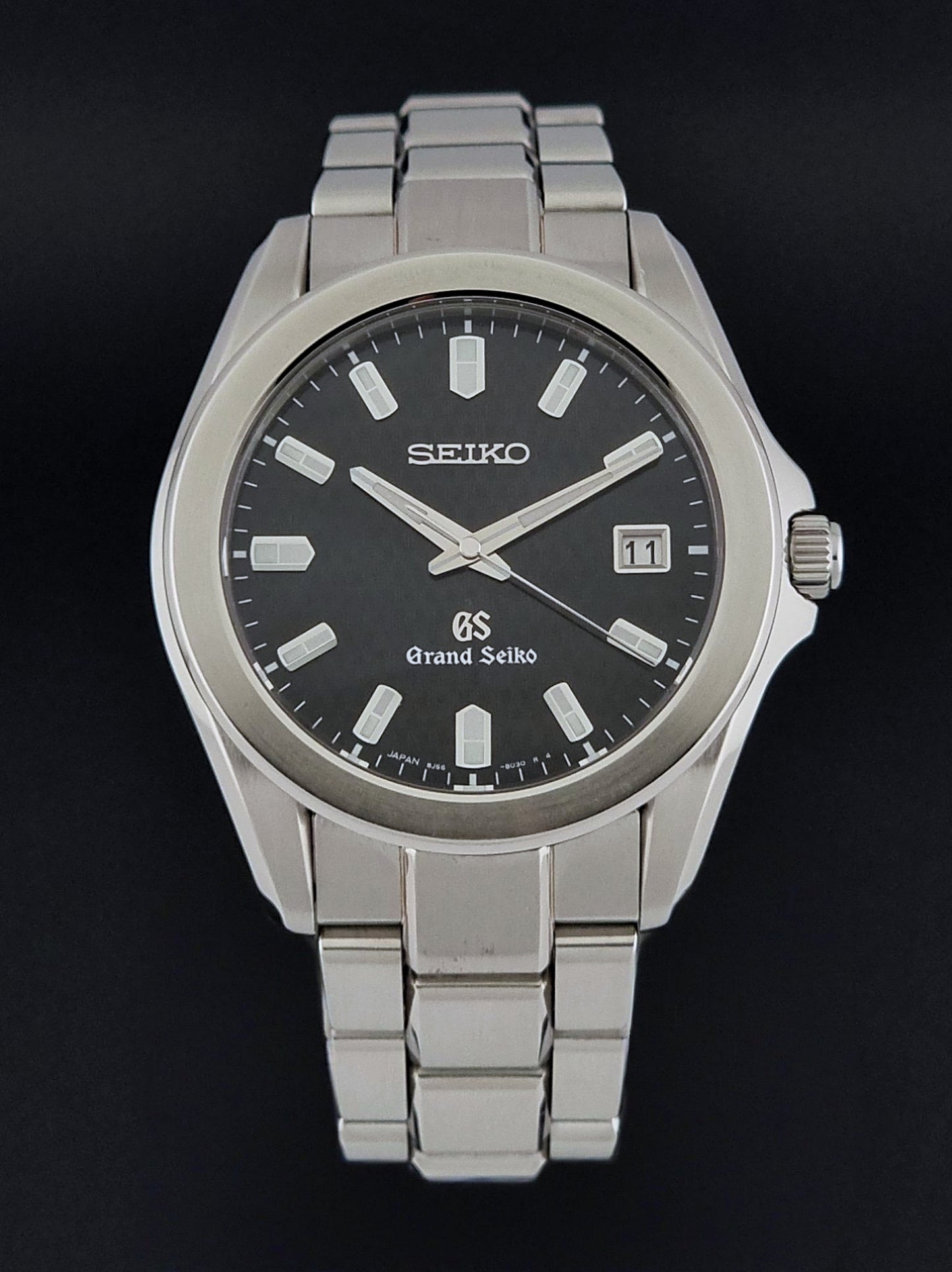 Grand Seiko SBGF021 quartz watch 8J56-8020 close up of the dial on a dark background