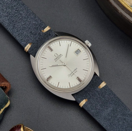Vintage Omega Seamaster watch on a dark background