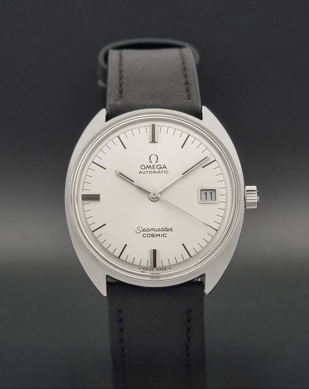 Vintage Omega Seamaster Cosmic 166.026 silver sunburst dial – dial and case front view