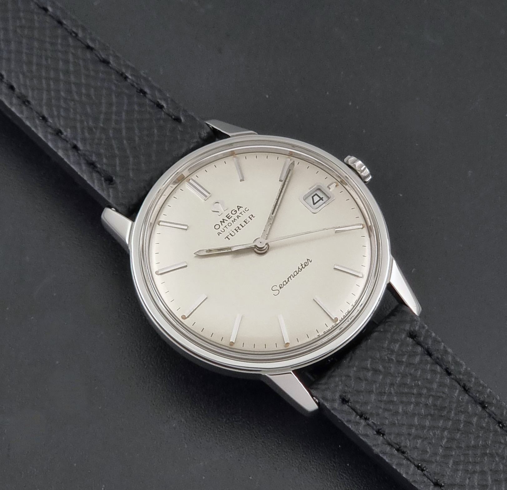 A Vintage Omega Seamaster Wristwatch 166.002 Turler dial on a dark background angled view