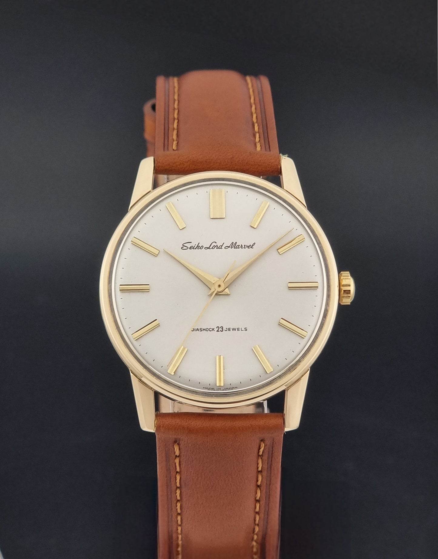 Vintage Seiko Lord Marvel 5740-1990 Wristwatch on a dark background front view