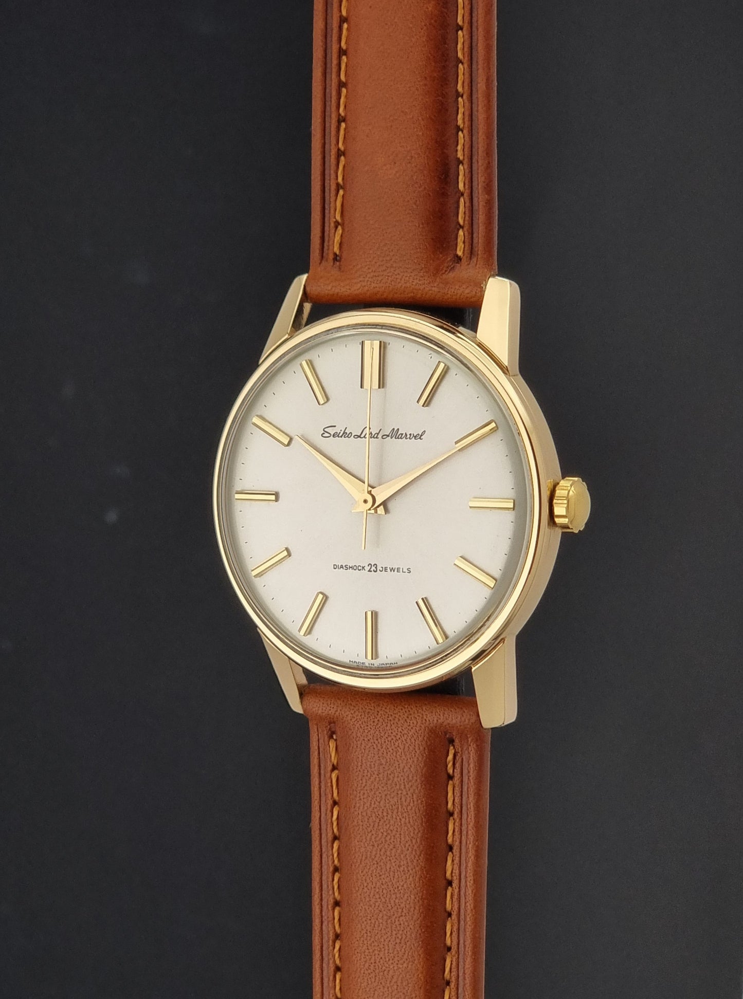 Vintage Seiko Lord Marvel 5740-1990 Wristwatch on a dark background crown side profile