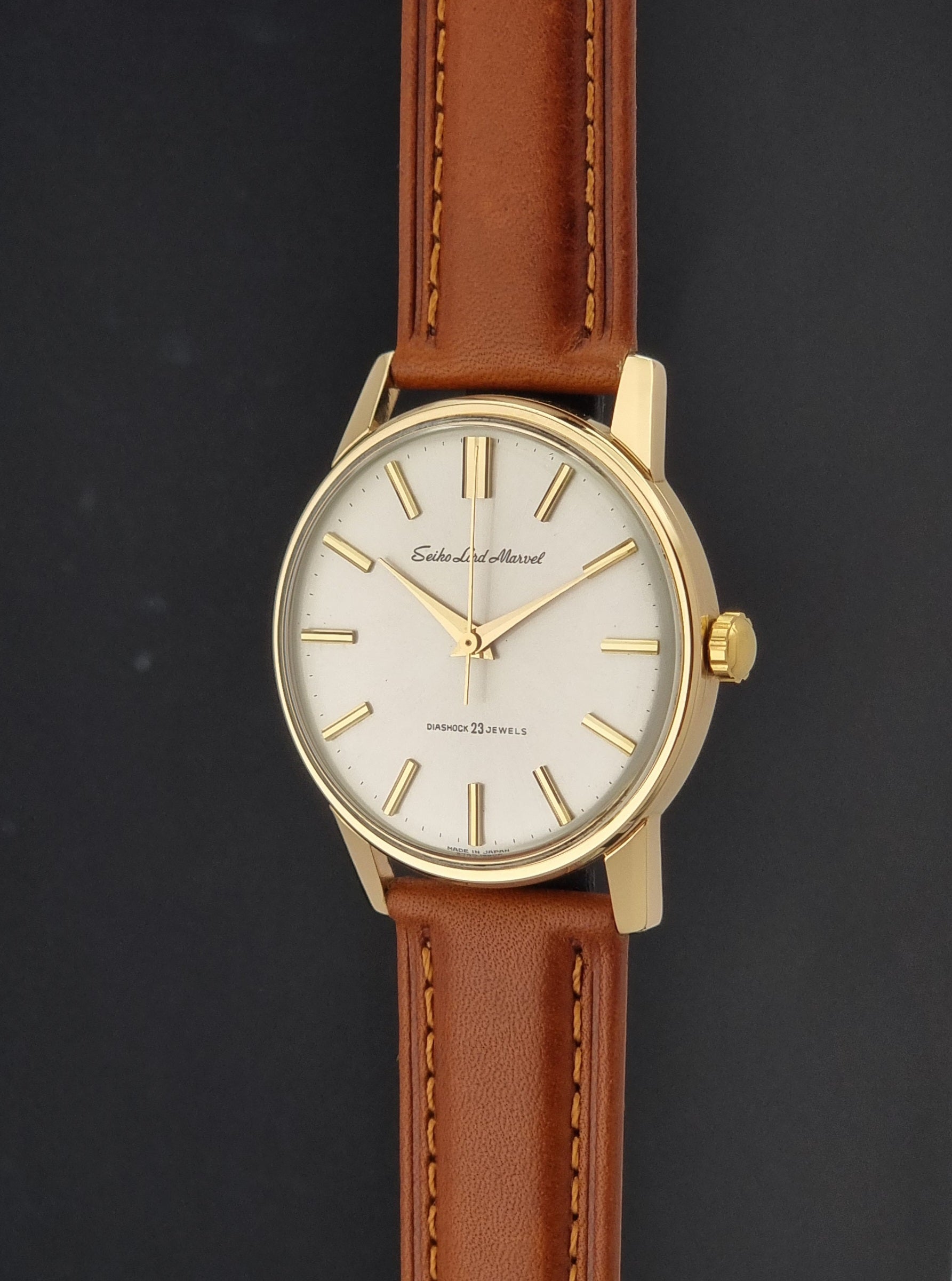 Vintage Seiko Lord Marvel 5740-1990 Wristwatch on a dark background crown side profile