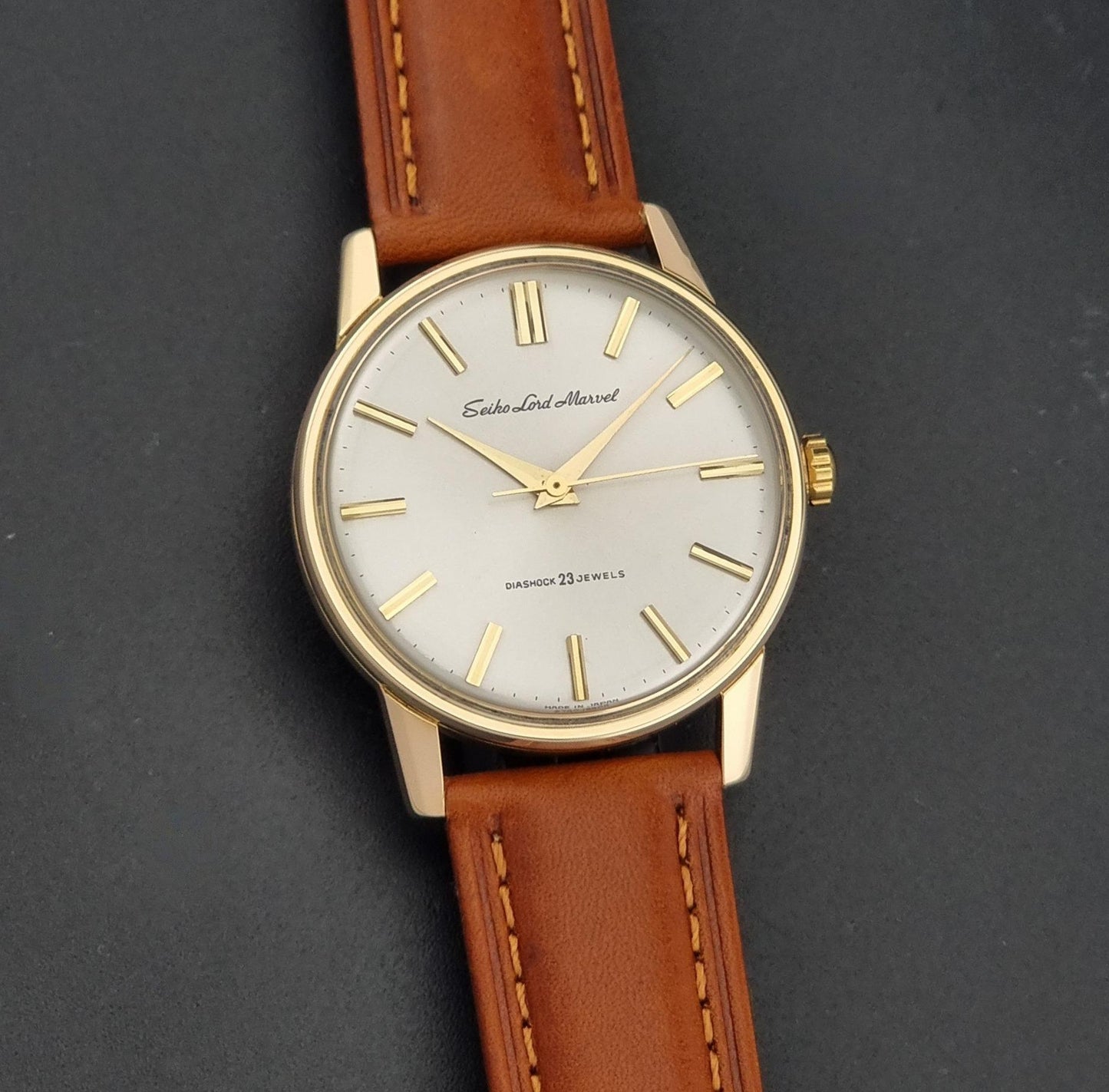 Vintage Seiko Lord Marvel 5740-1990 Wristwatch on a dark background dial view