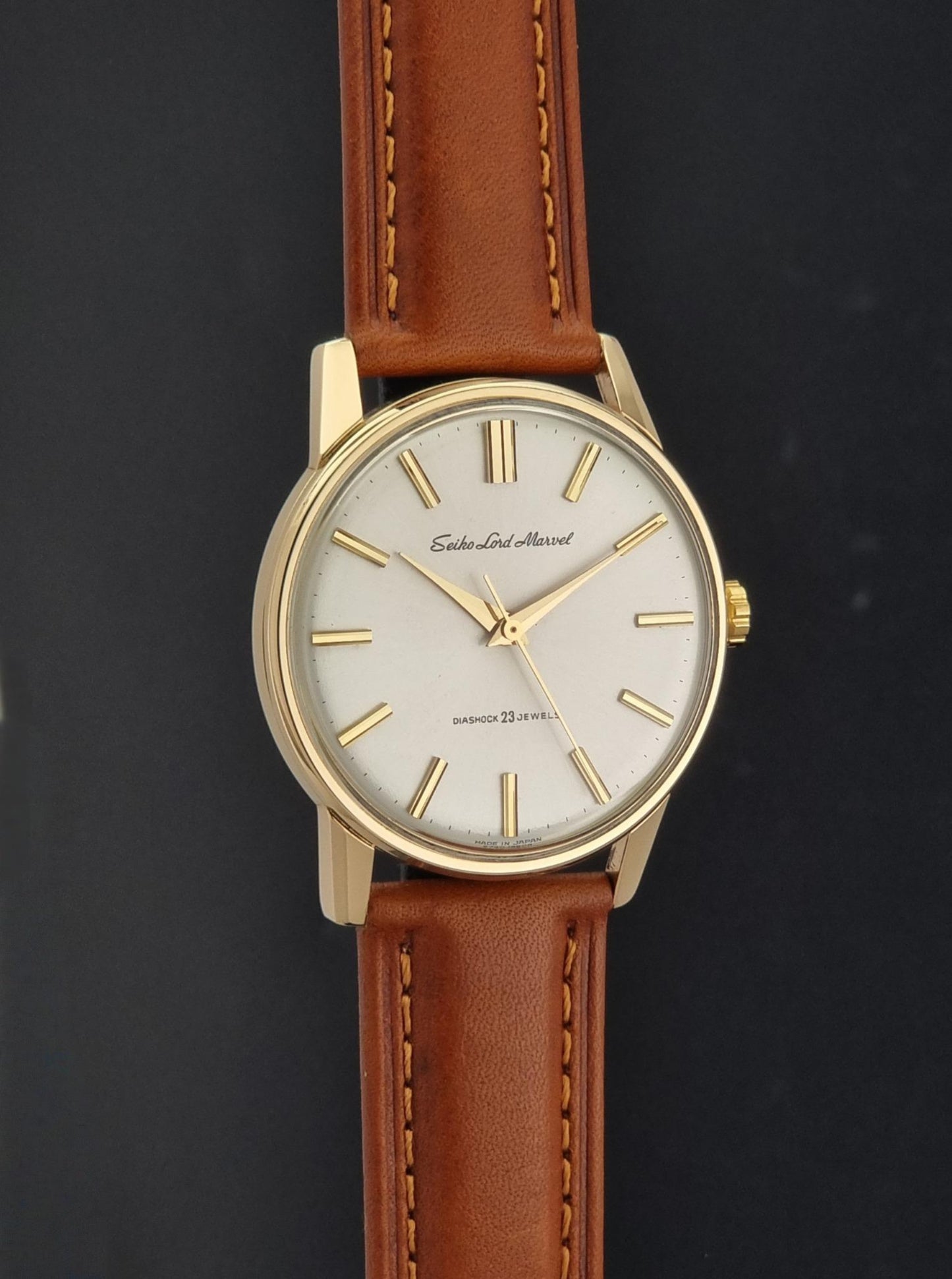 Vintage Seiko Lord Marvel 5740-1990 Wristwatch on a dark background side profile