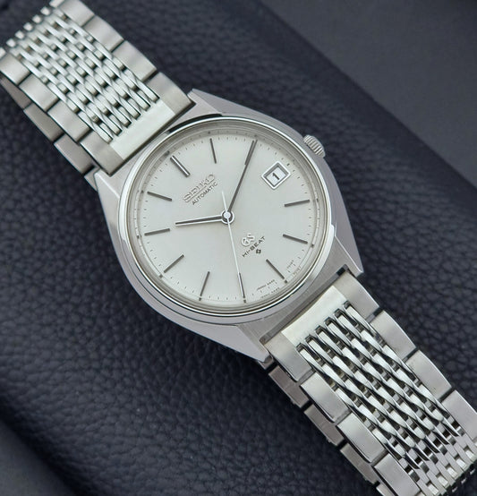 Vintage Grand Seiko Wristwatch 5646-7010 on a textured dark background