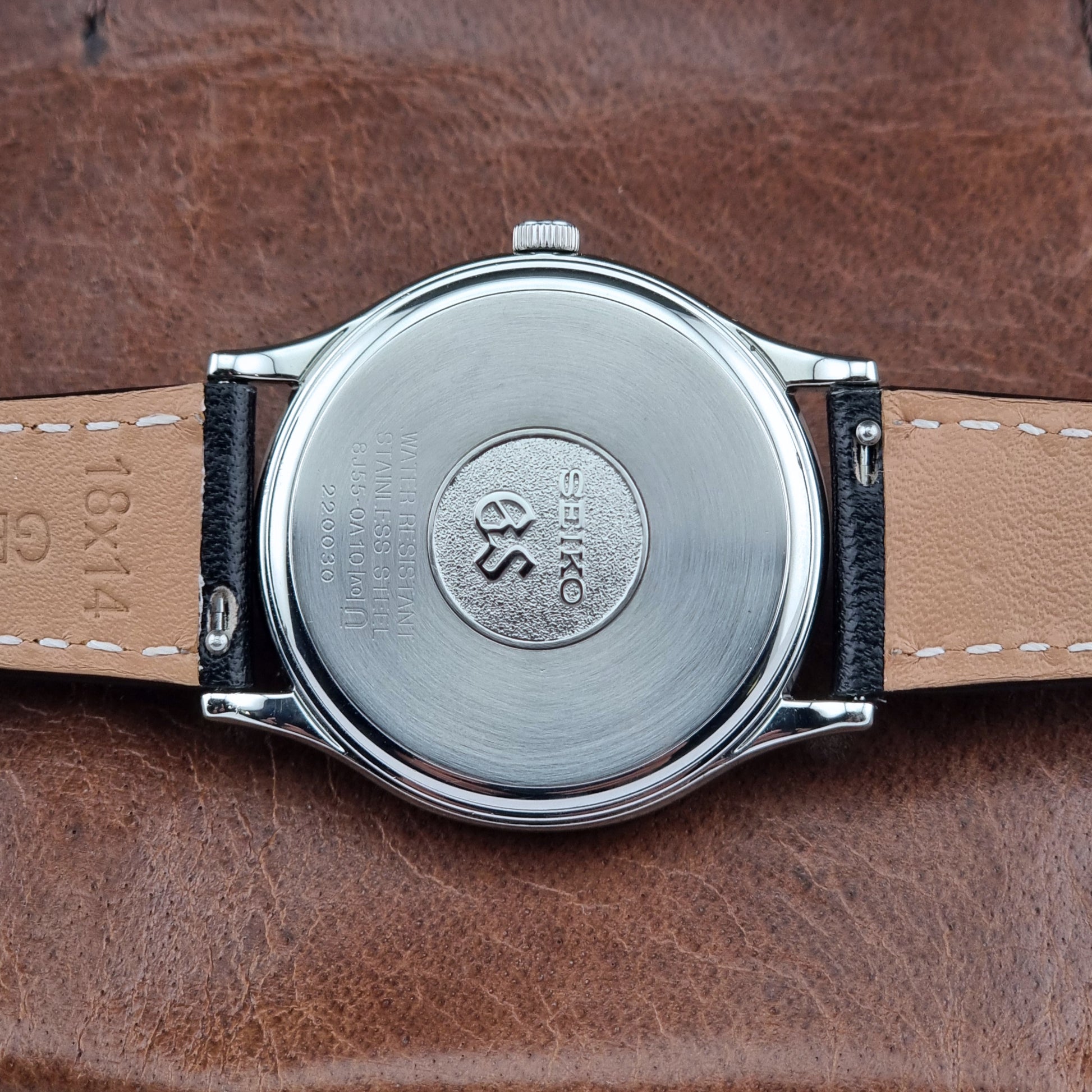 Back view of a Grand Seiko SBGF015 Wristwatch 8J55-0A10 quartz on a black leather strap