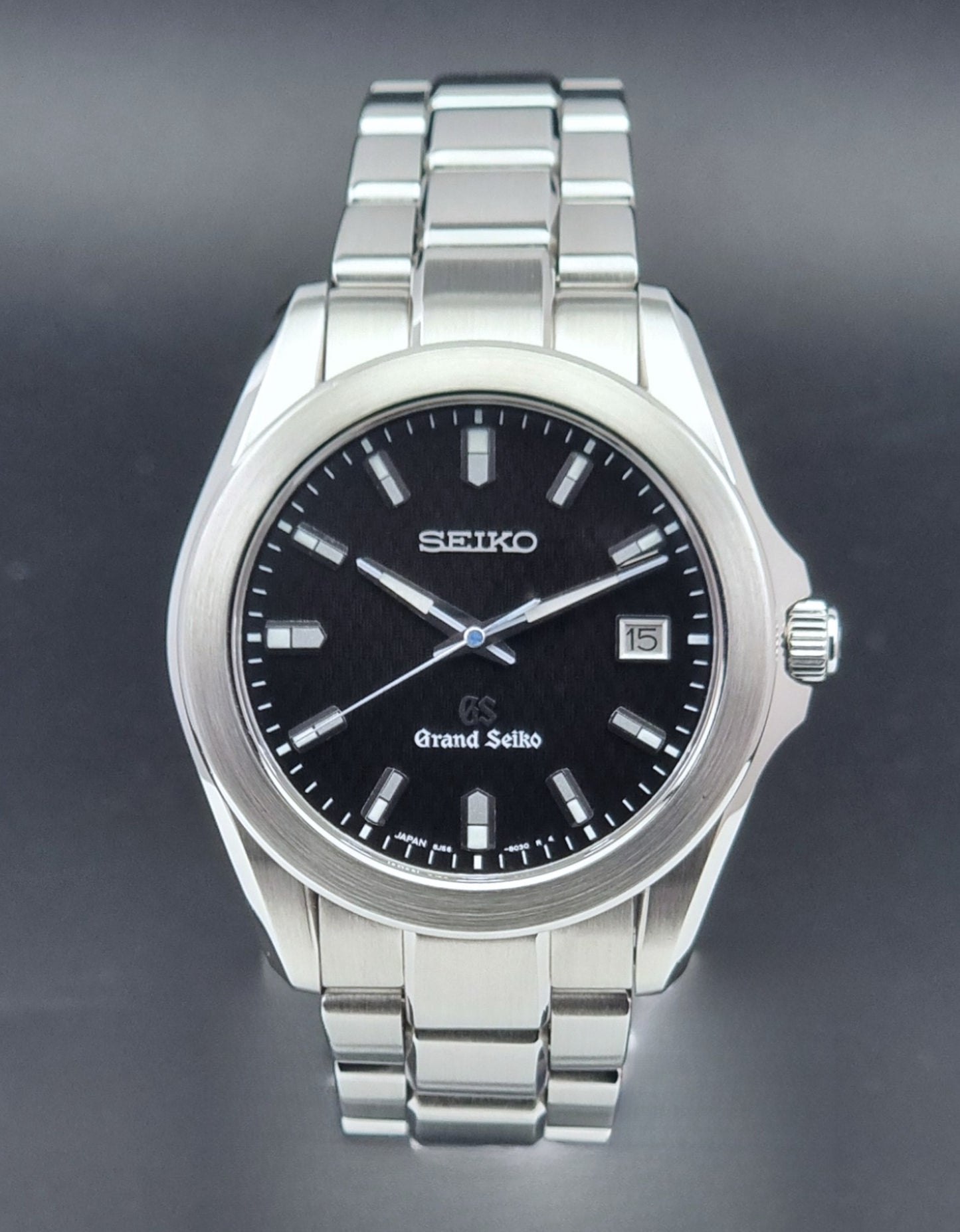 Grand Seiko SBGF021 quartz 8J56-8020 watch with a dark face on a dark background close up dial view