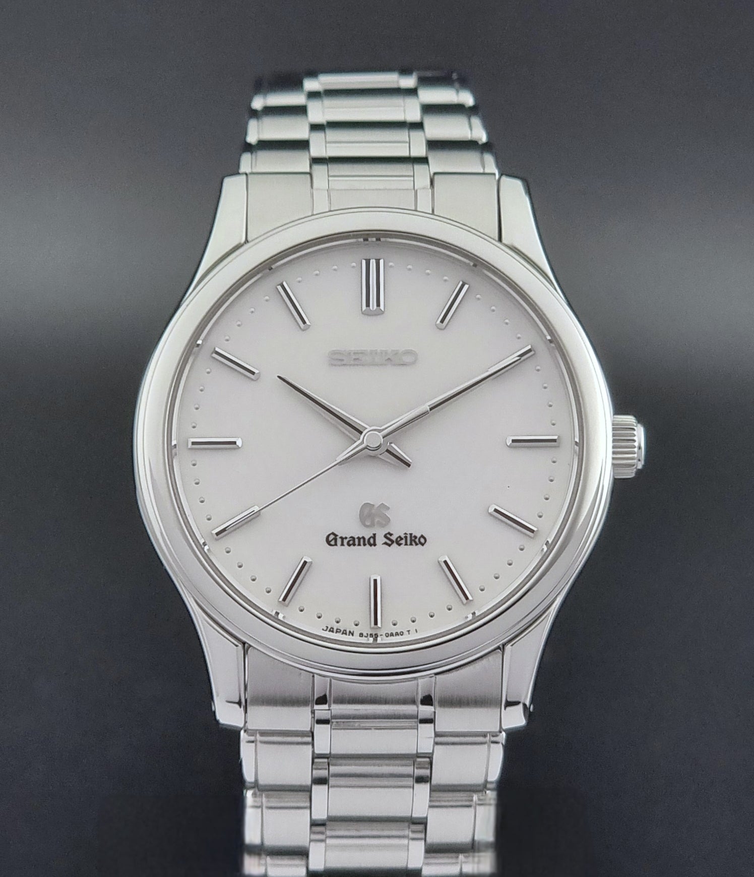 Grand Seiko SBGF027 quartz watch 8J55-0AA0 watch on a dark textured background close up dial view