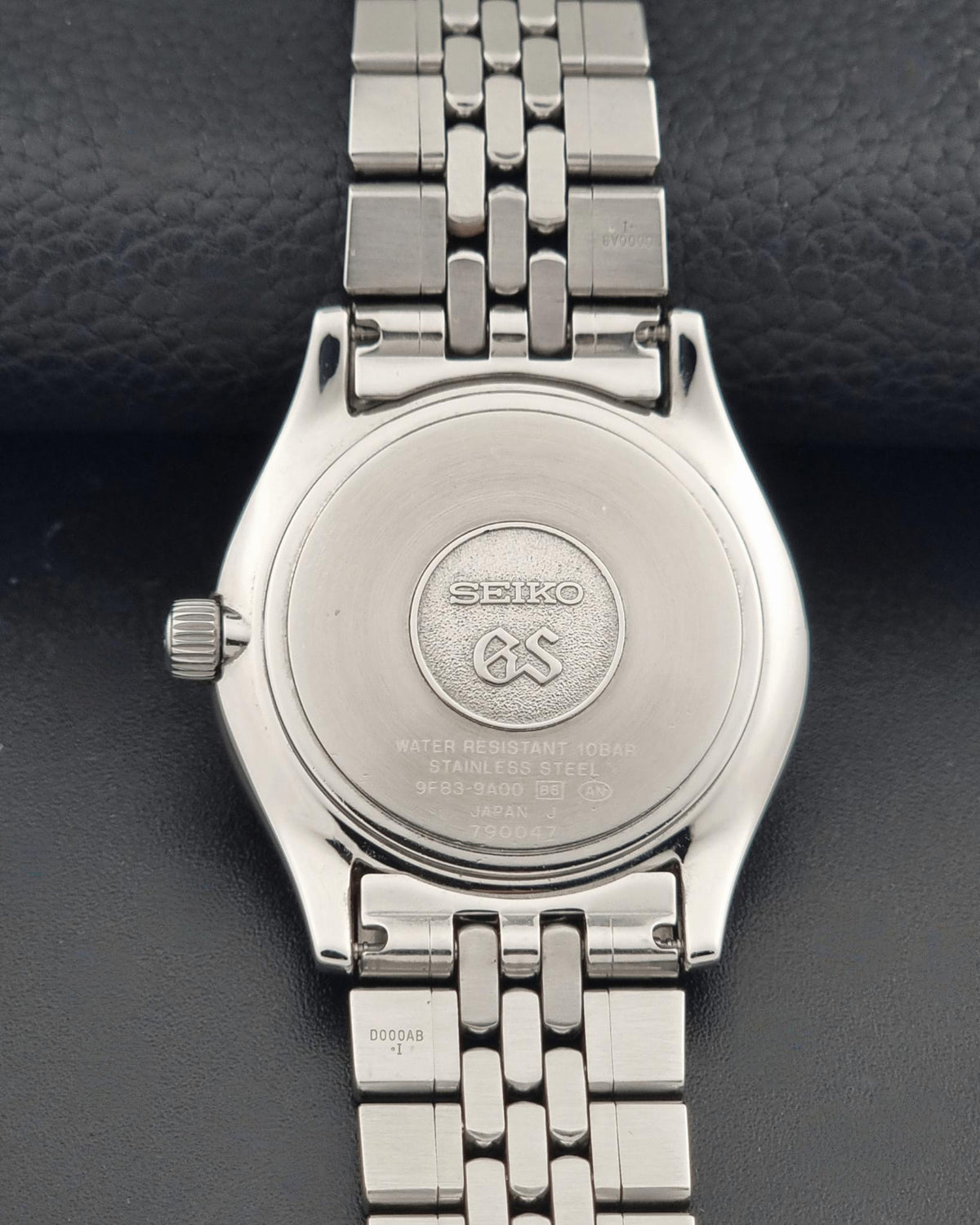 1997 vintage Grand Seiko SBGT001 9F83 quartz watch; caseback view showing the rear case and visible markings