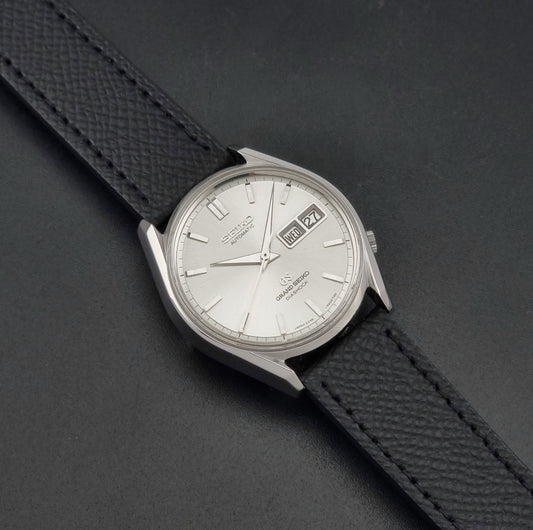 Vintage Grand Seiko 6246-9001 Wristwatch on a dark background dial