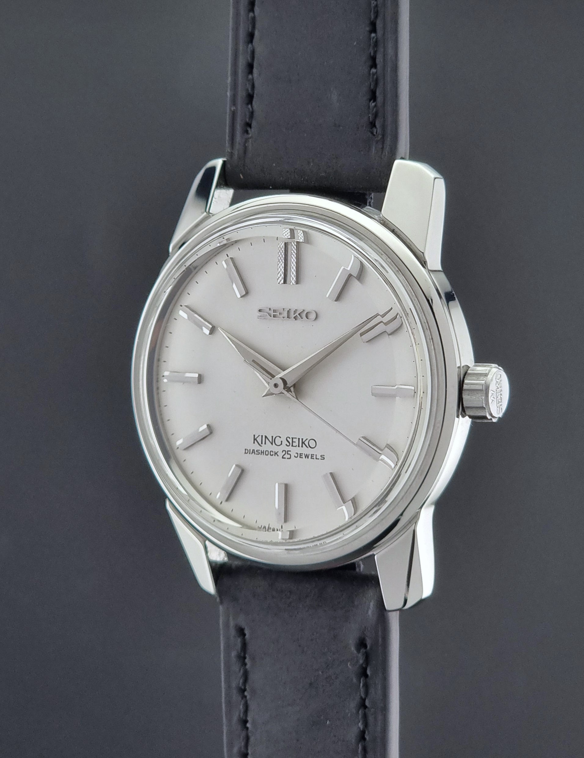 Vintage King Seiko 44-999 Watch with black leather strap on a dark background