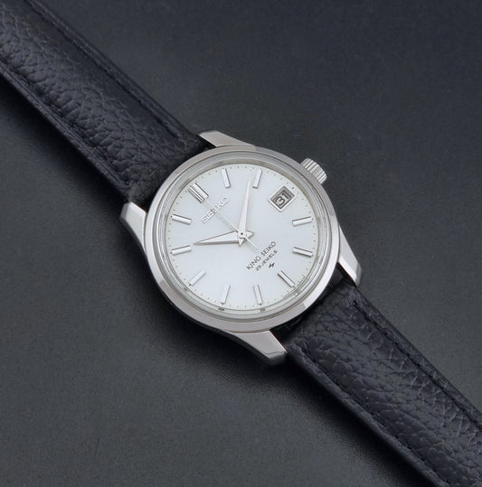Vintage King Seiko 4402-8000 Wristwatch with a white dial on a dark background dial