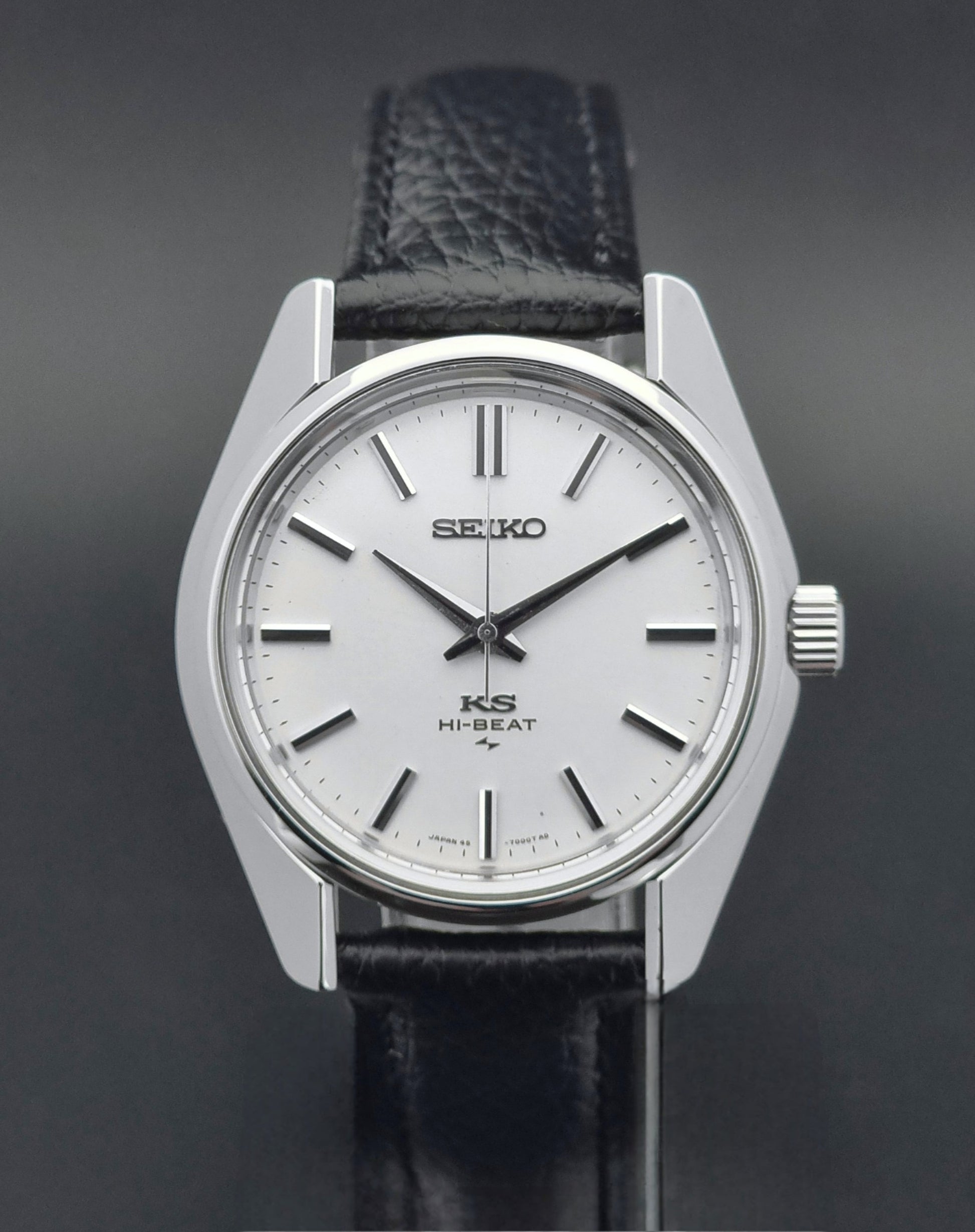 King Seiko 45-7001 watch with black leather strap on a dark background