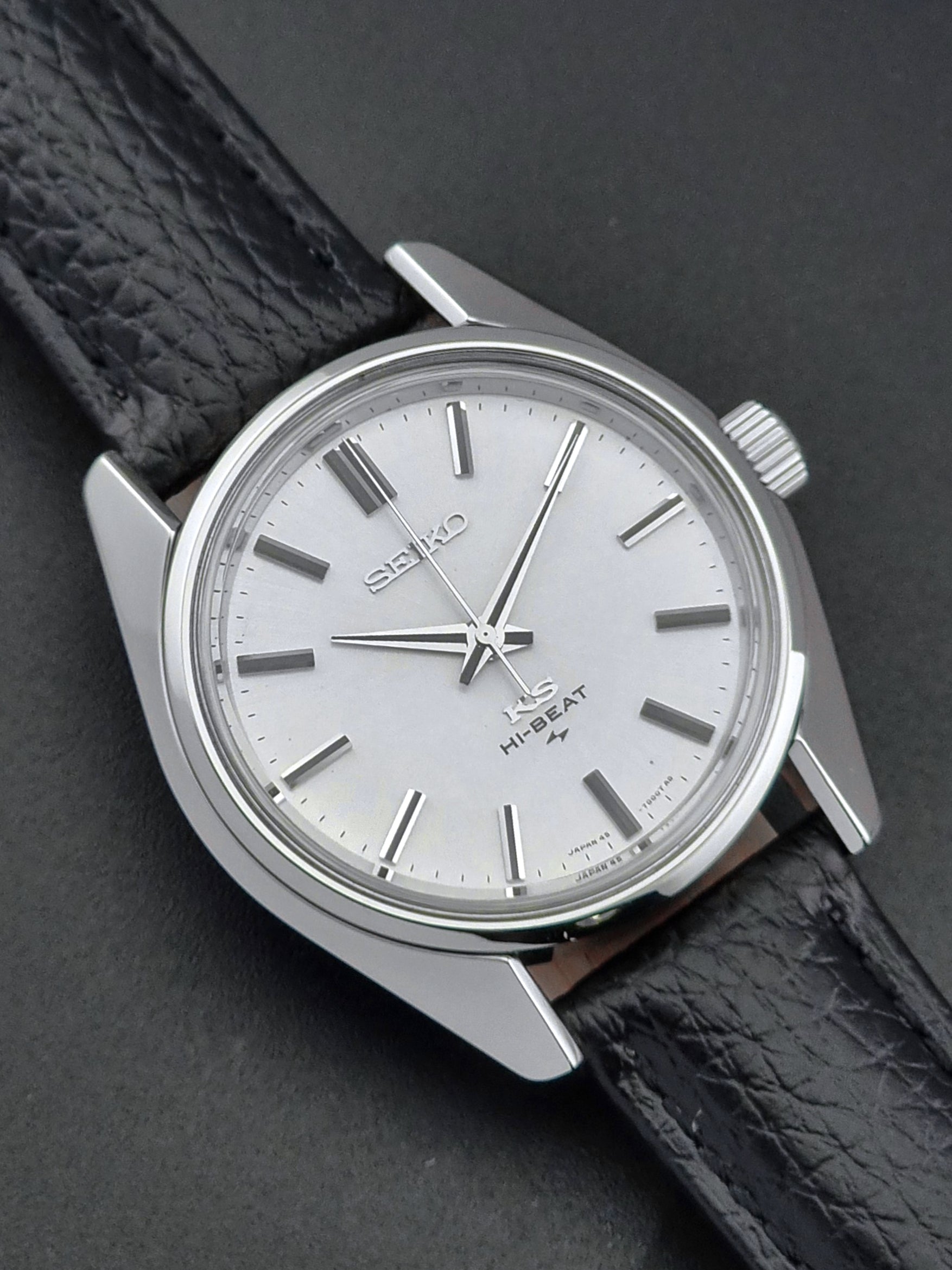 King Seiko 45-7001 watch with black leather strap on a dark background