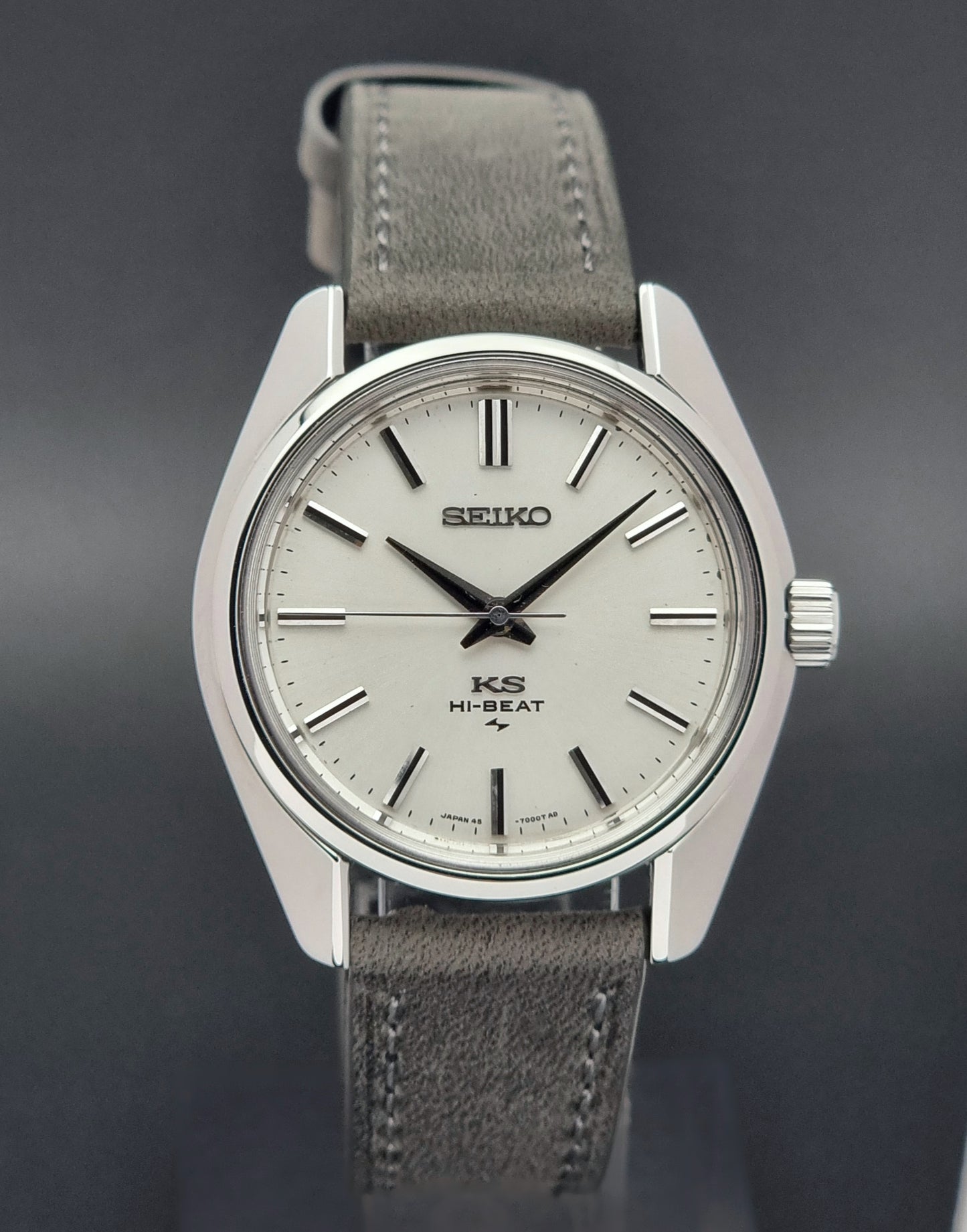 Vintage King Seiko watch with gray strap on a dark background