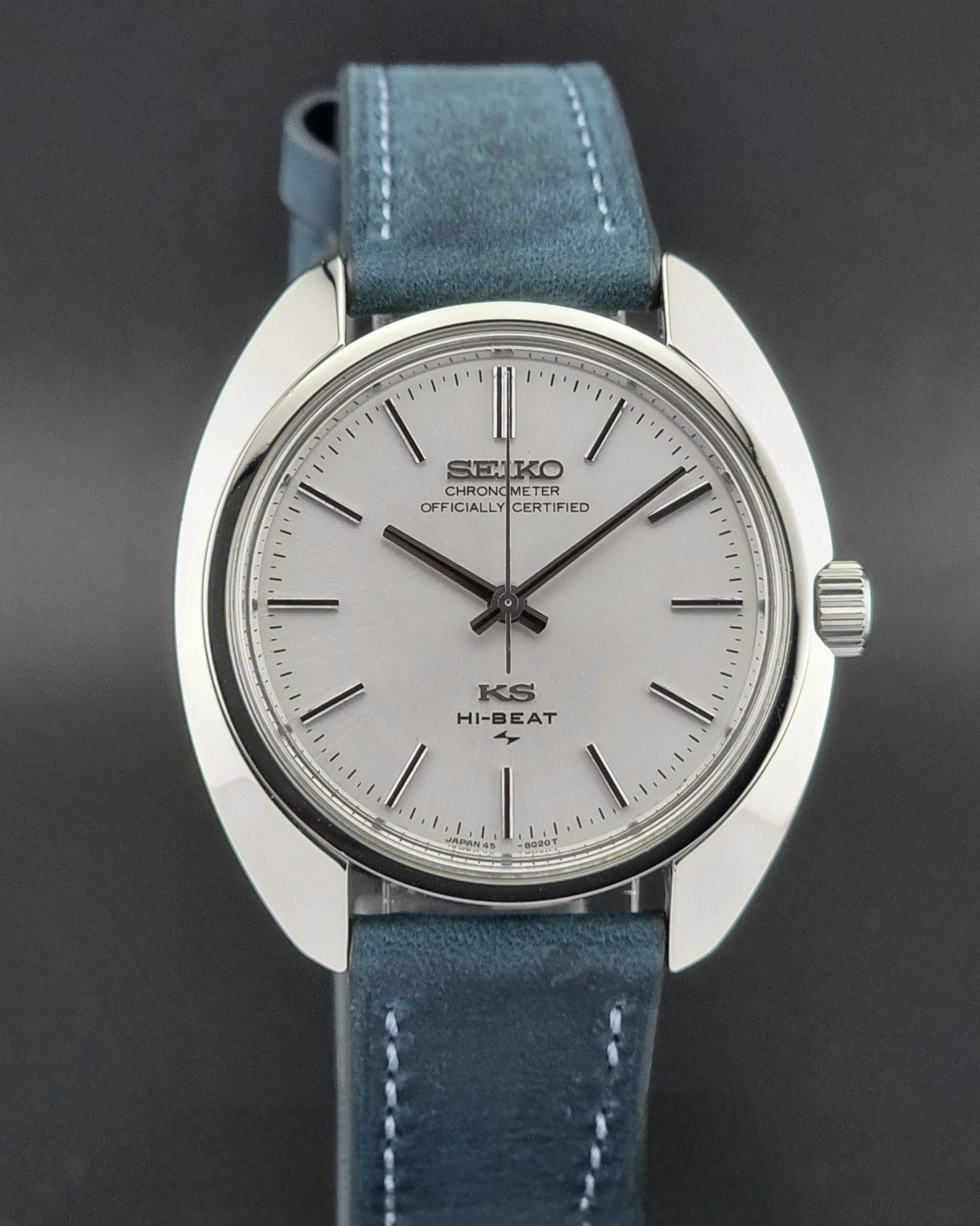 Vintage King Seiko watch with blue strap on a dark background