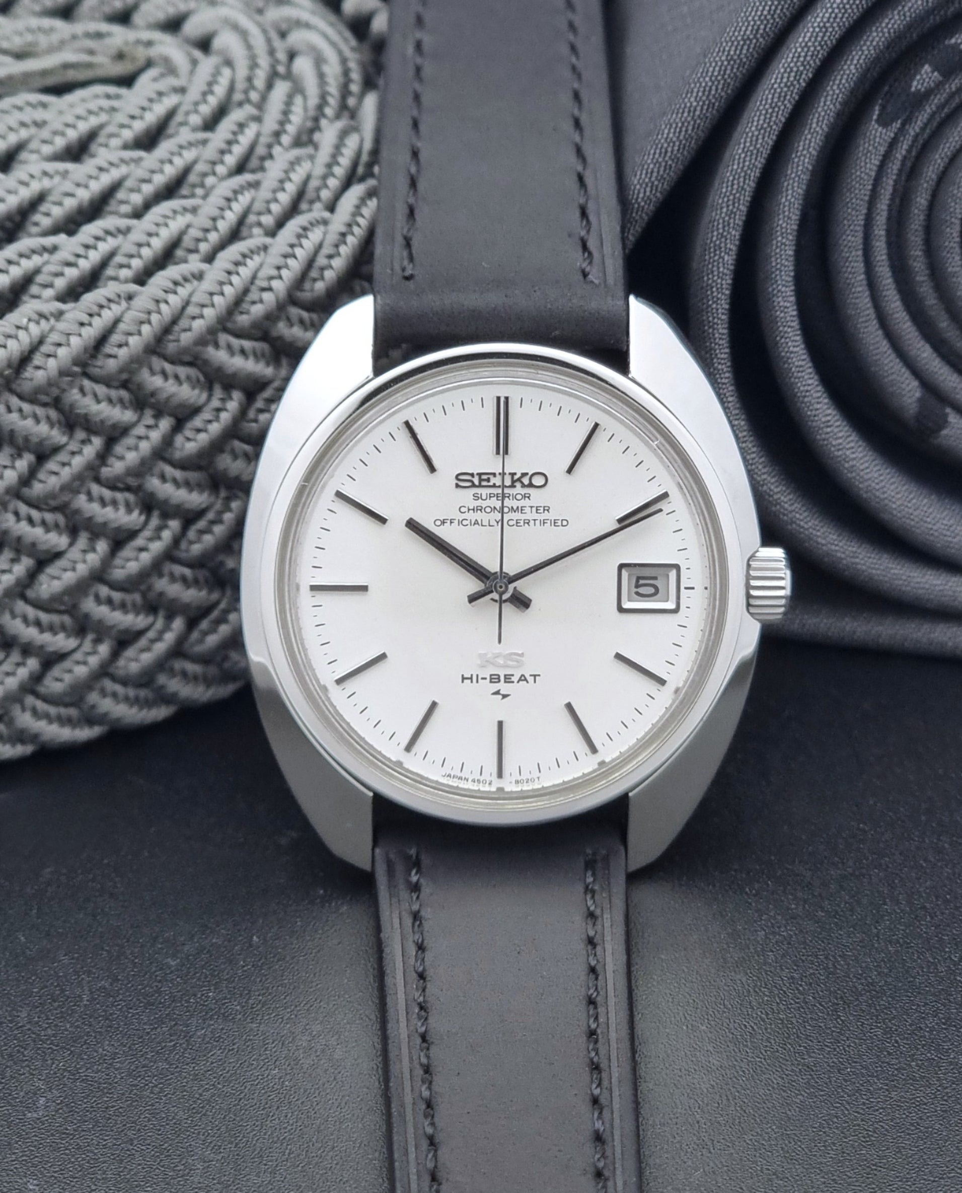Vintage King Seiko Watch 4502-8010 with a black leather strap on a dark background dial view