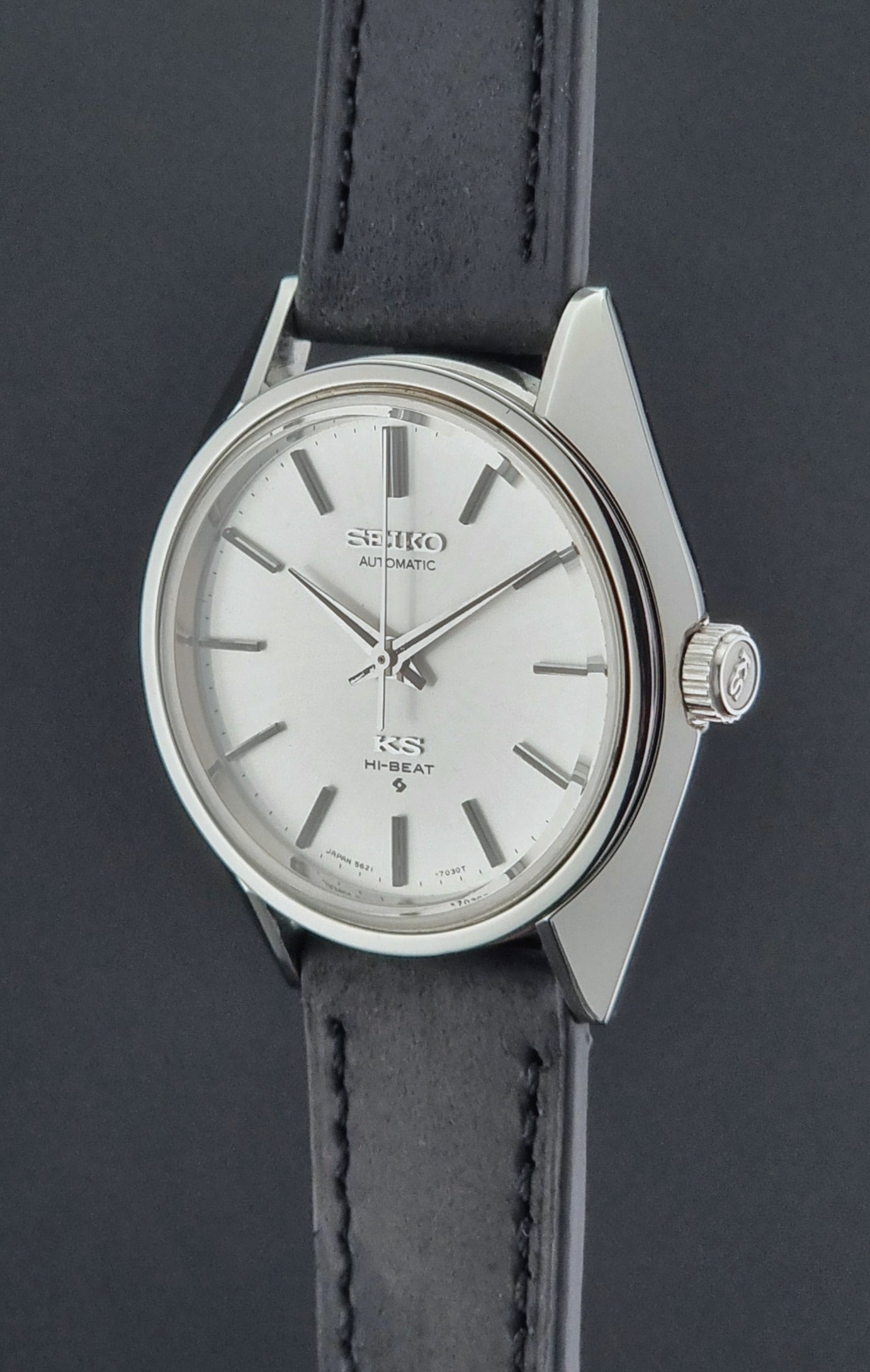 King Seiko watch with a black leather strap on a dark background