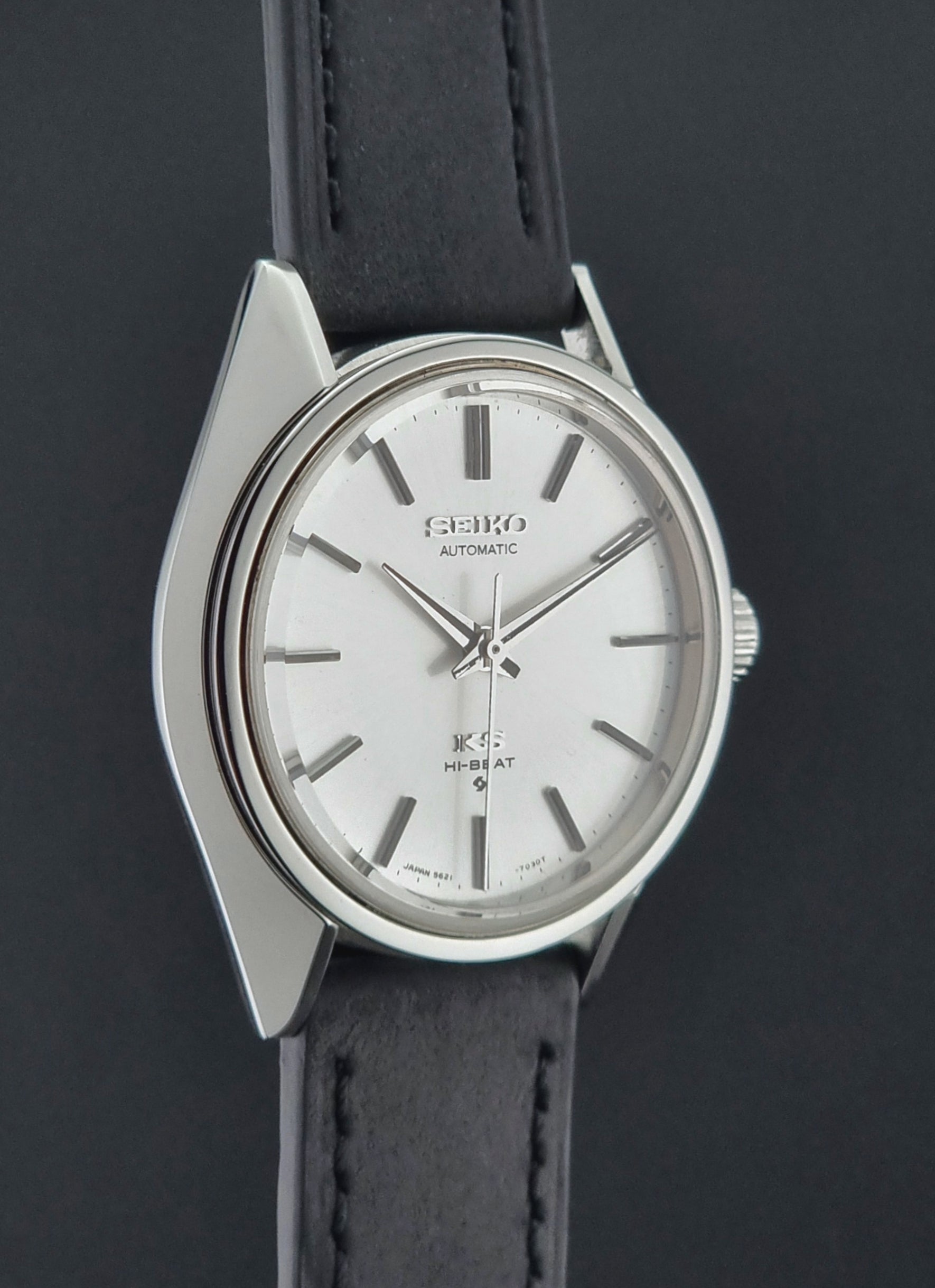 King Seiko watch with black leather strap on a dark background