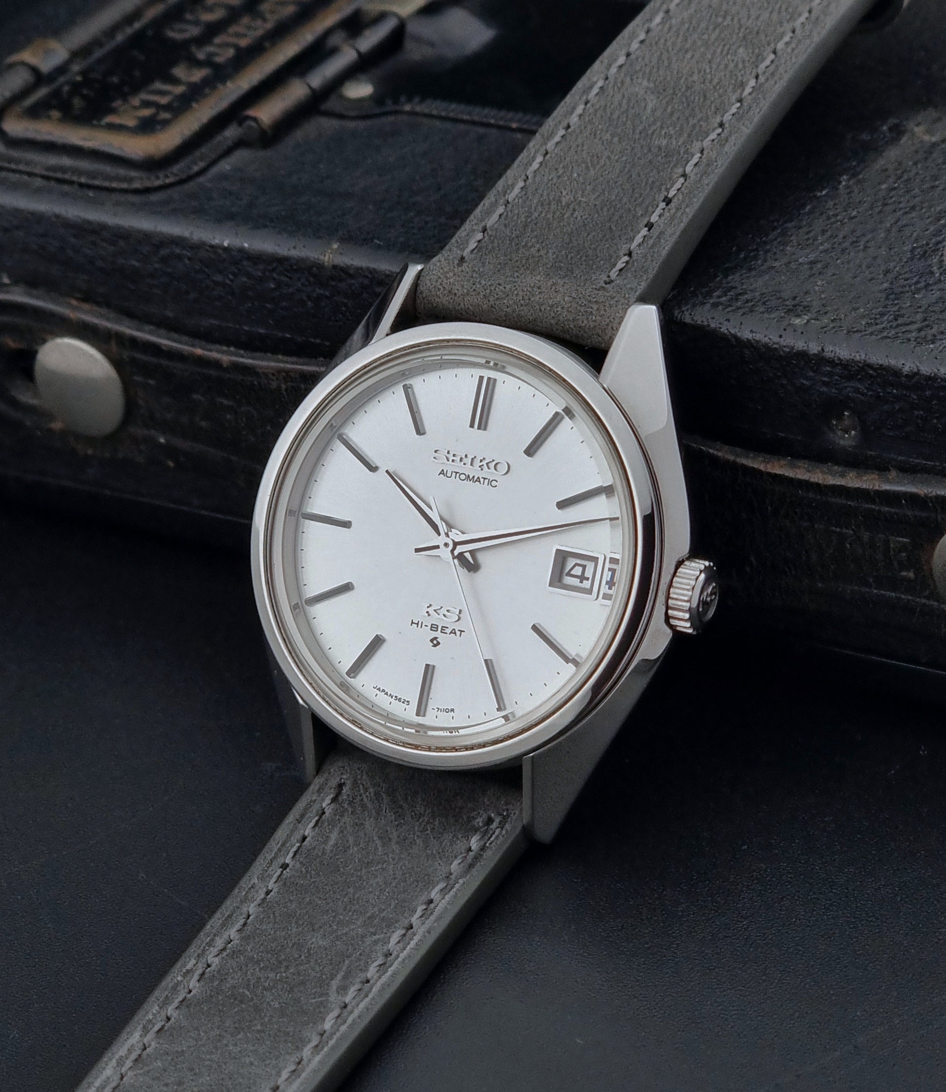 Vintage King Seiko Wristwatch 5625-7111 on a grey leather strap
