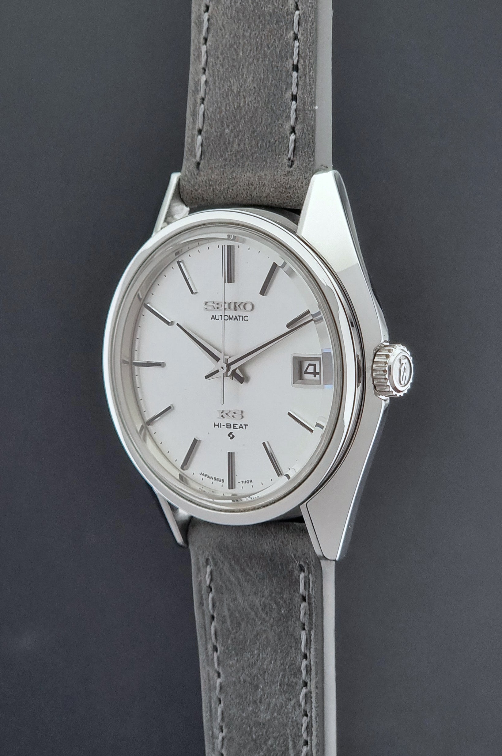 Vintage King Seiko Wristwatch 5625-7111 on a grey leather strap