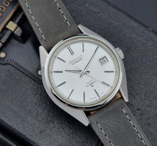Vintage King Seiko Wristwatch 5625-7111 on a grey leather strap