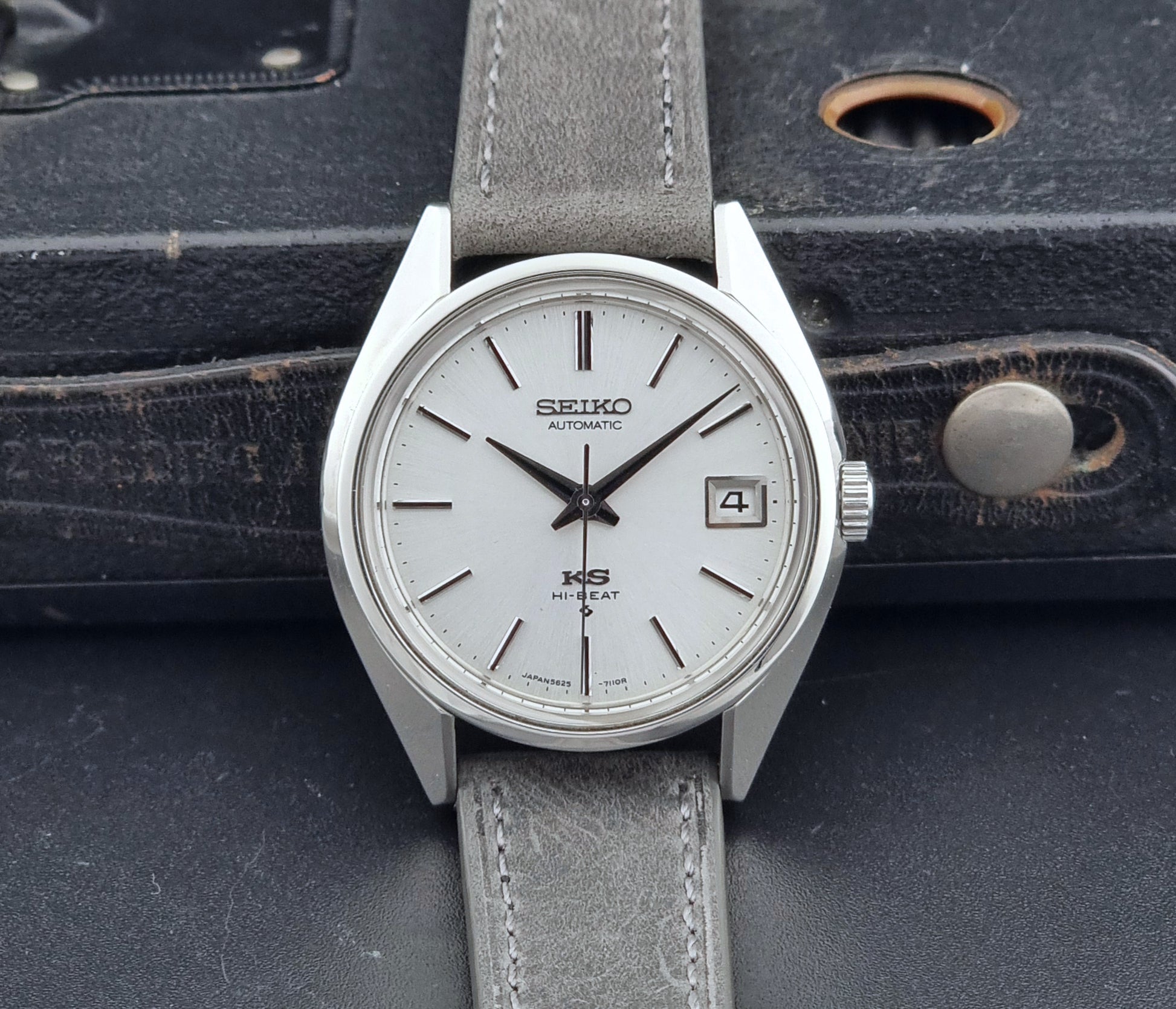 Vintage King Seiko Wristwatch 5625-7111 on a grey leather strap