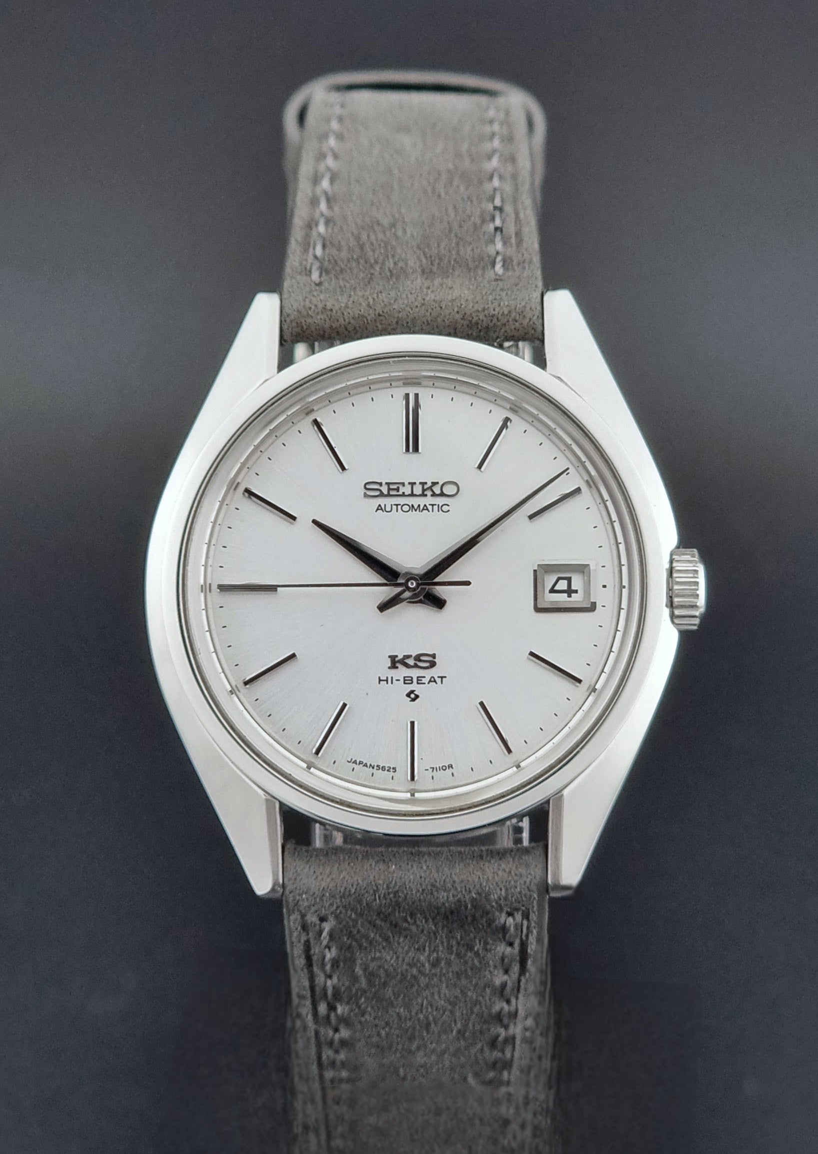 Vintage King Seiko Wristwatch 5625-7111 on a grey leather strap