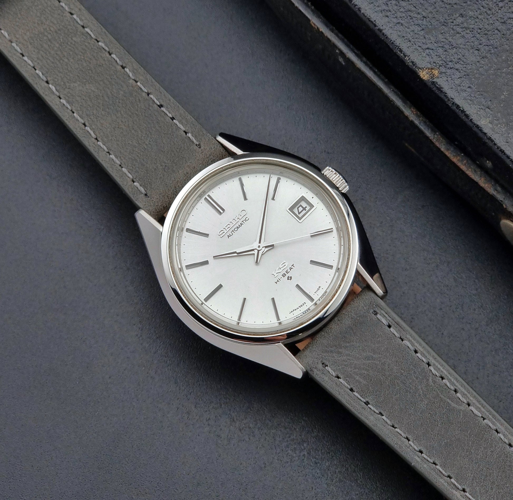 Vintage King Seiko Wristwatch 5625-7111 on a grey leather strap
