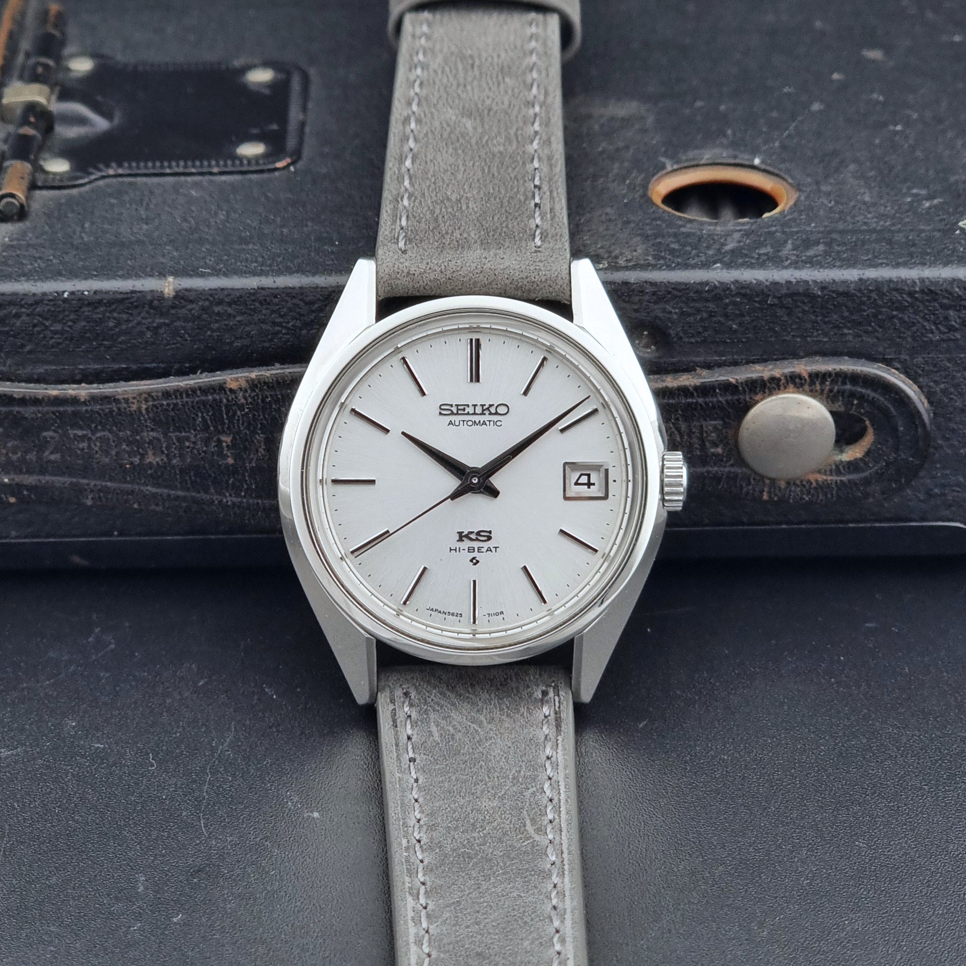 Vintage King Seiko Wristwatch 5625-7111 on a grey leather strap