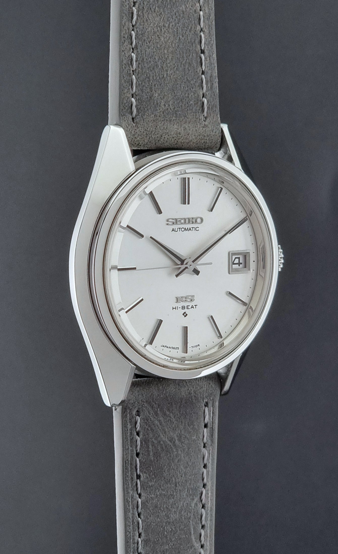 Vintage King Seiko Wristwatch 5625-7111 on a grey leather strap