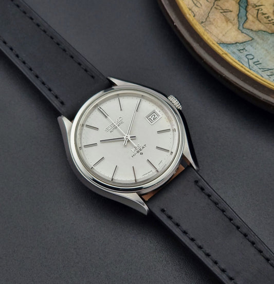 Vintage King Seiko Wristwatch 5625-7120 on a black strap at a jaunty angle