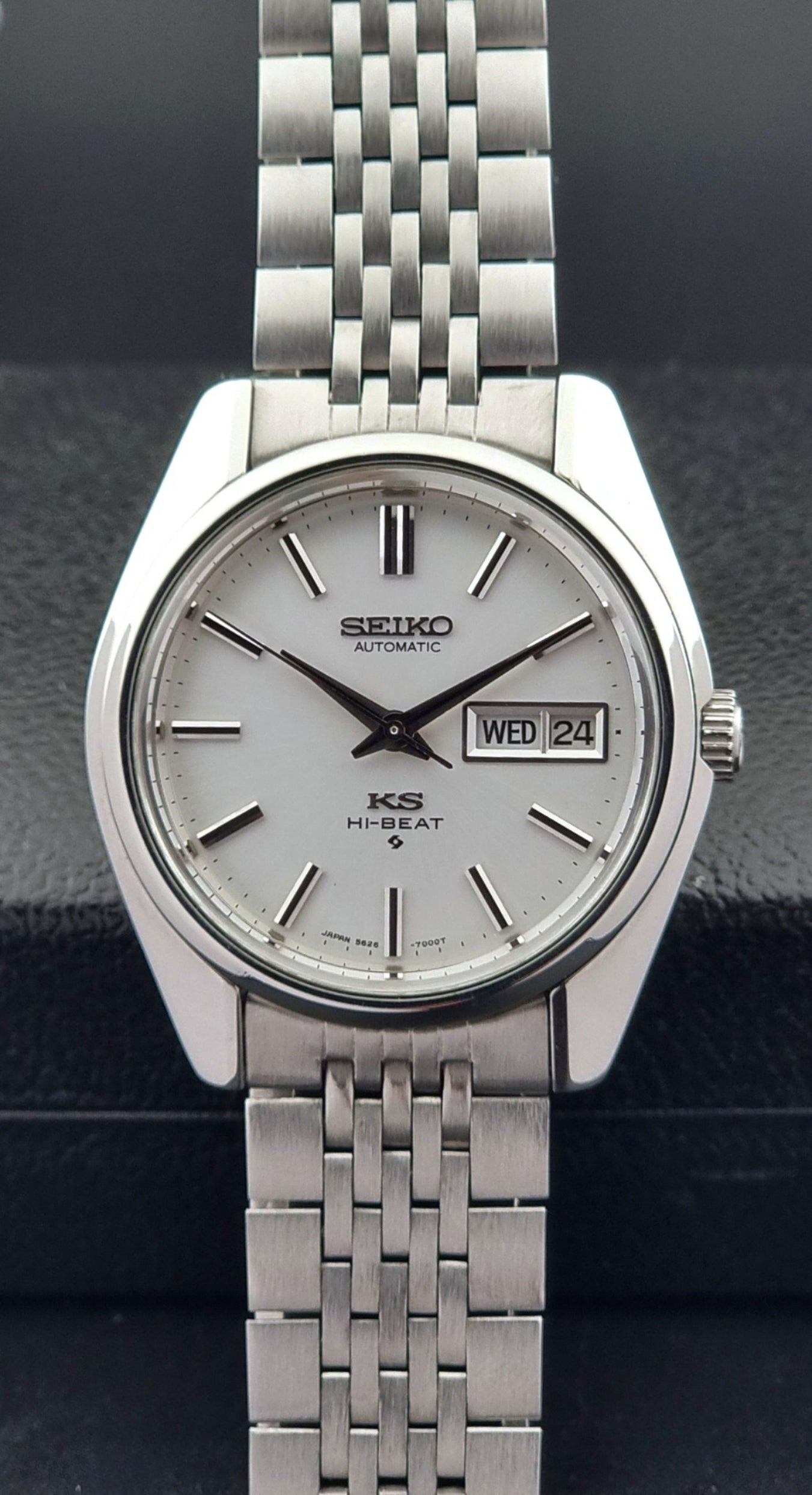 Vintage King Seiko watch with a metal bracelet on a dark background
