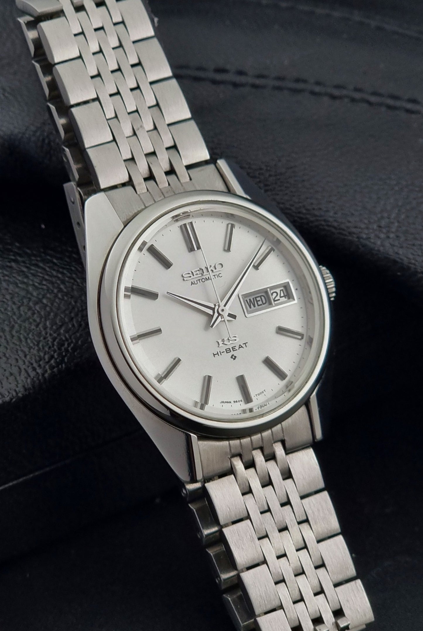 Vintage King Seiko watch with a metal bracelet on a dark background