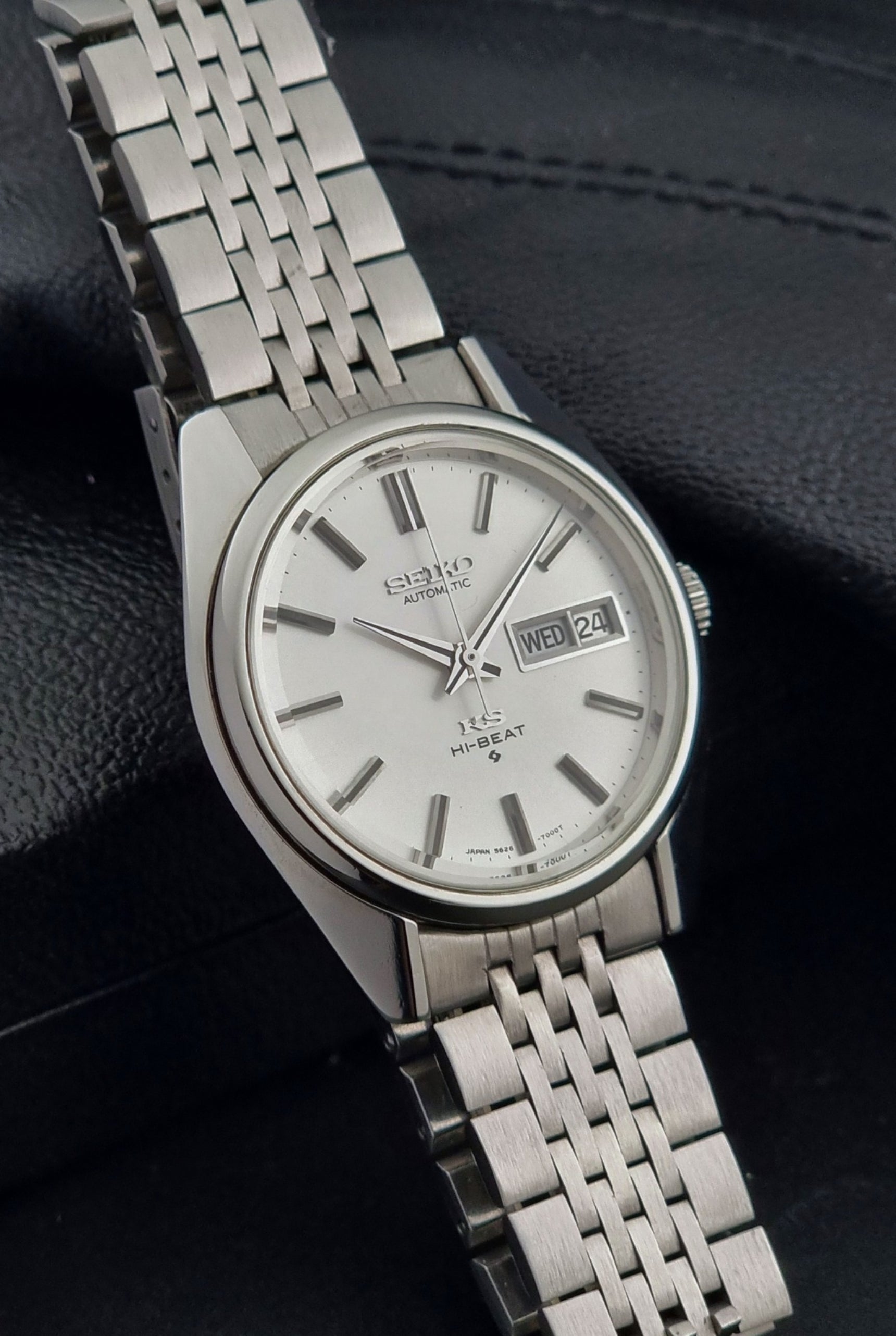 Vintage King Seiko watch with a metal bracelet on a dark background