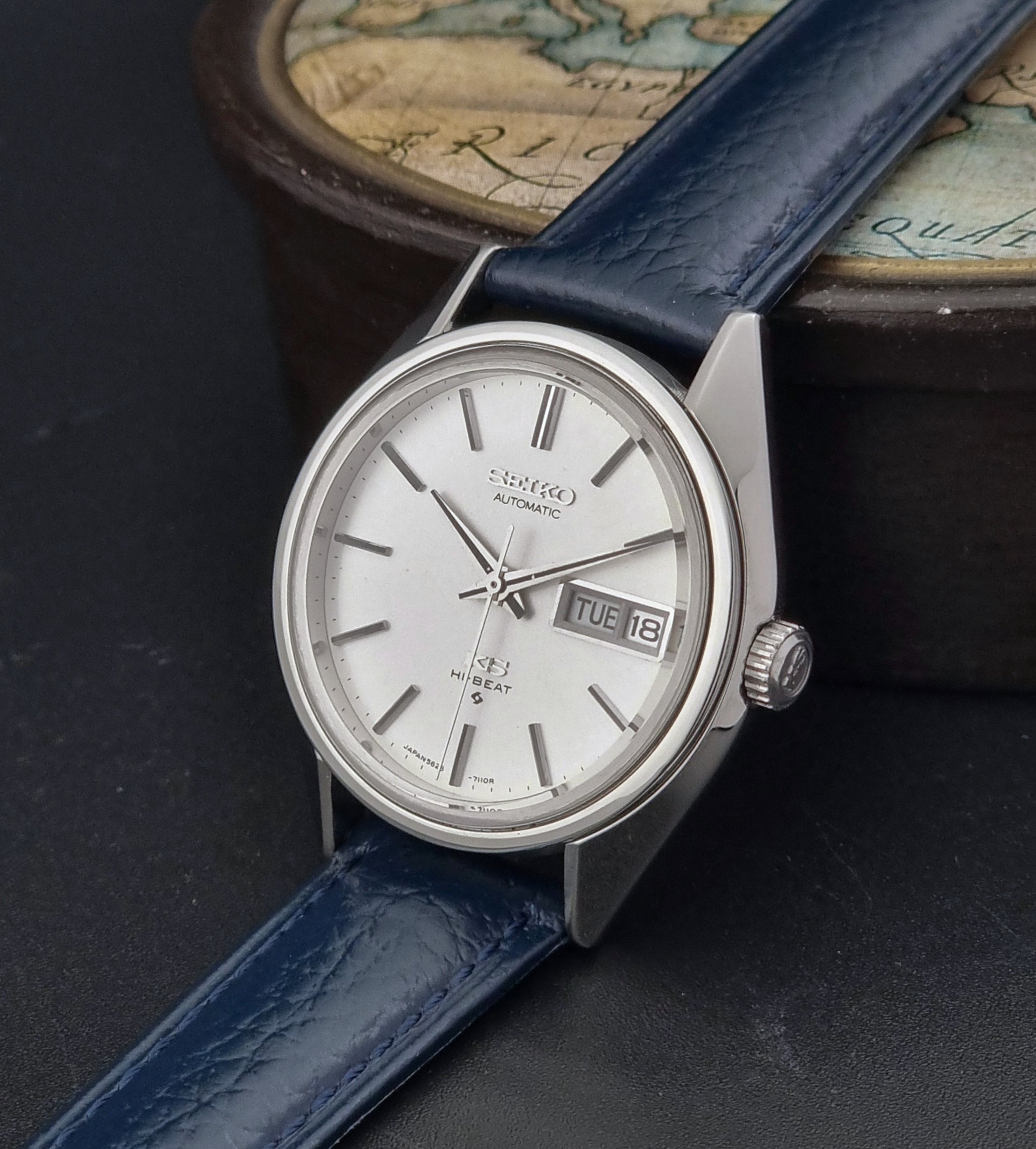 Vintage King Seiko 5626-71113 Wristwatch watch with blue strap on a dark surface
