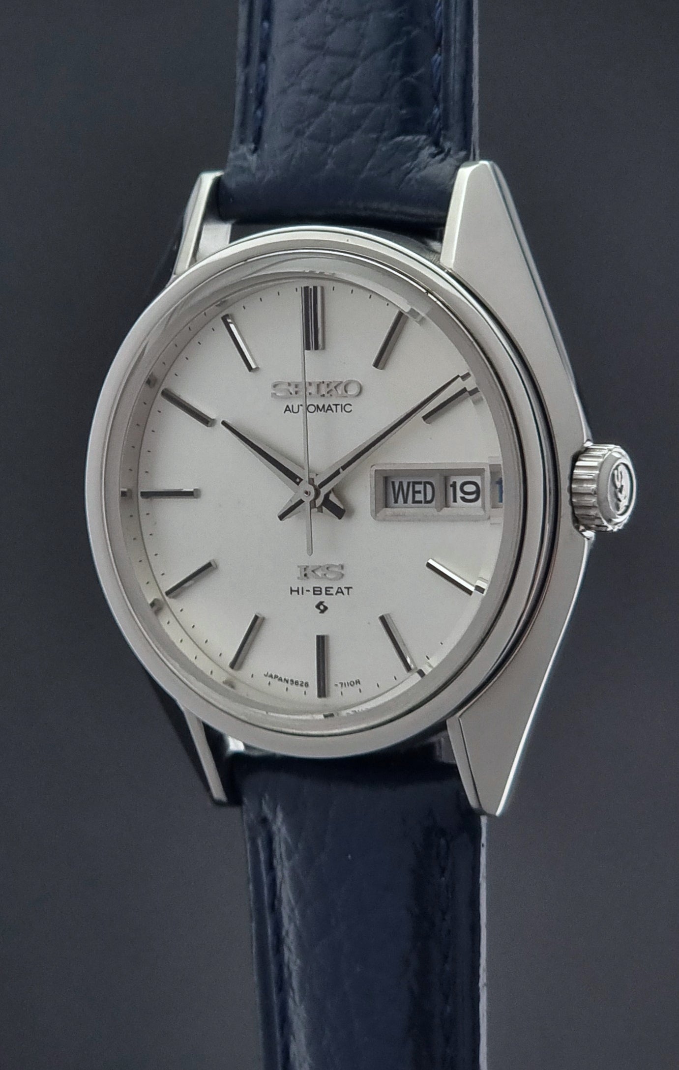 Vintage King Seiko 5626-71113 Wristwatch with blue strap on a dark background