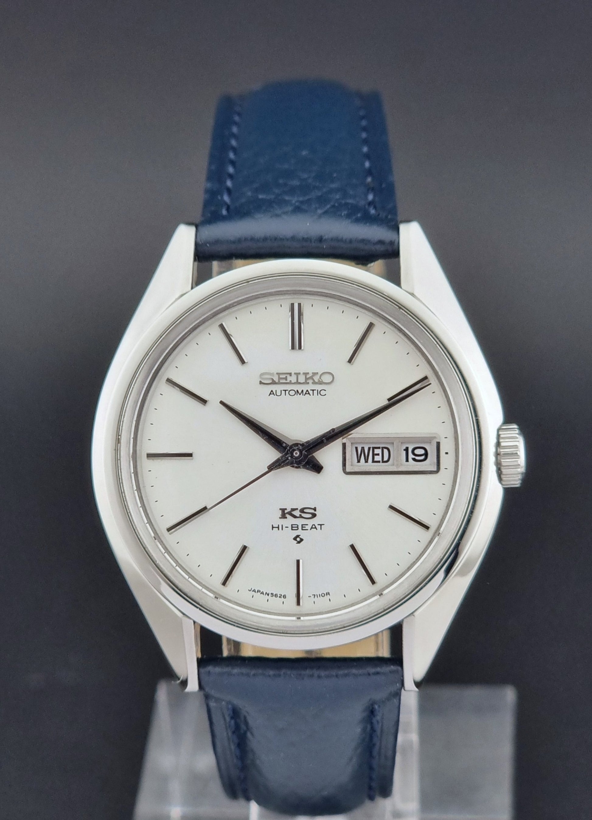 Vintage King Seiko 5626-71113 Wristwatch with blue leather strap on a dark background